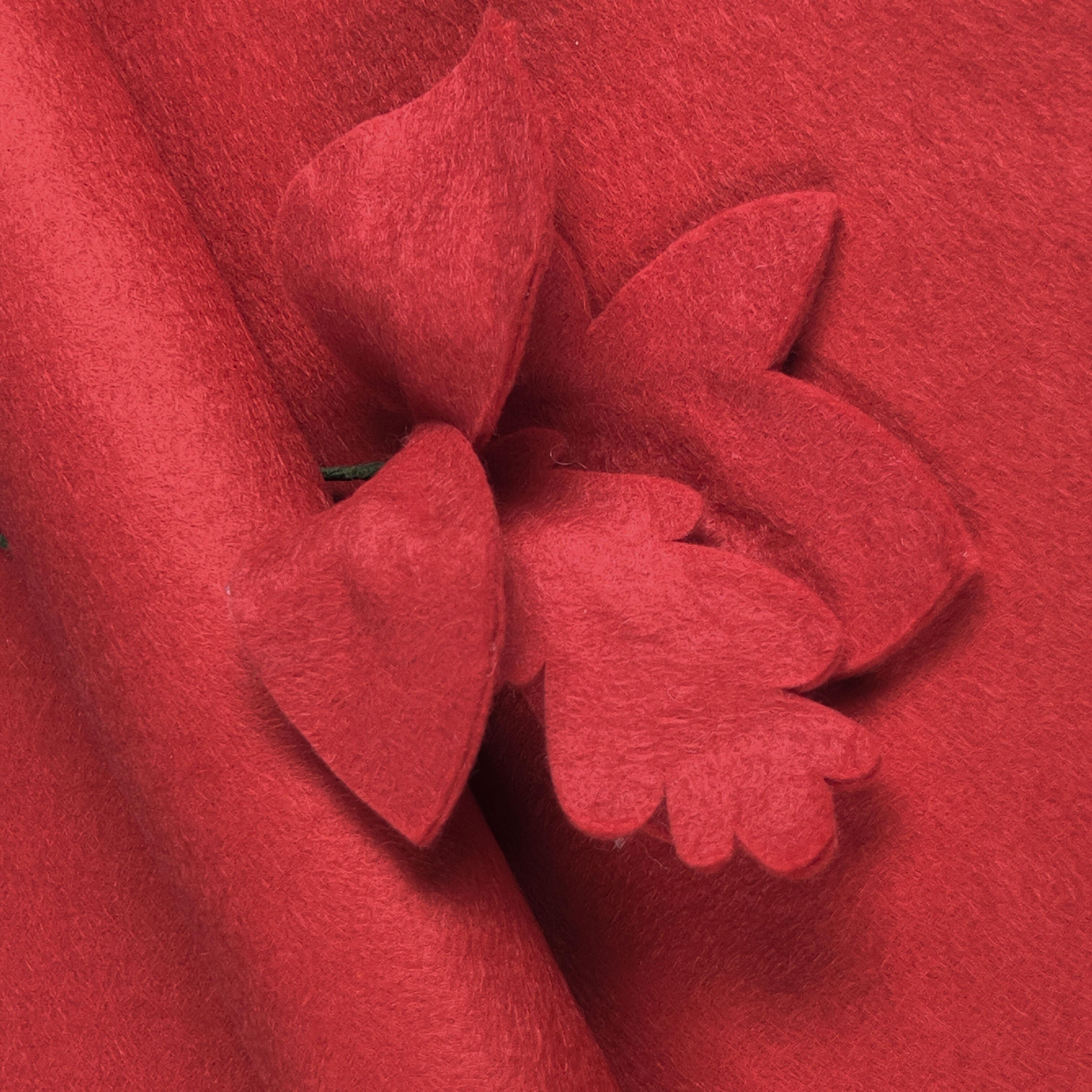 Classic bright red wool-blend felt sheet featuring decorative leaf cut-outs, showcasing a soft matte texture and clean, fray-free edges.