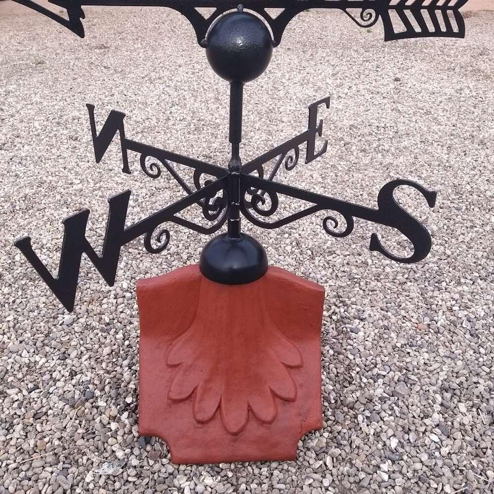 Angler weathervane on a ridge tile finial fitting with multiple angle options