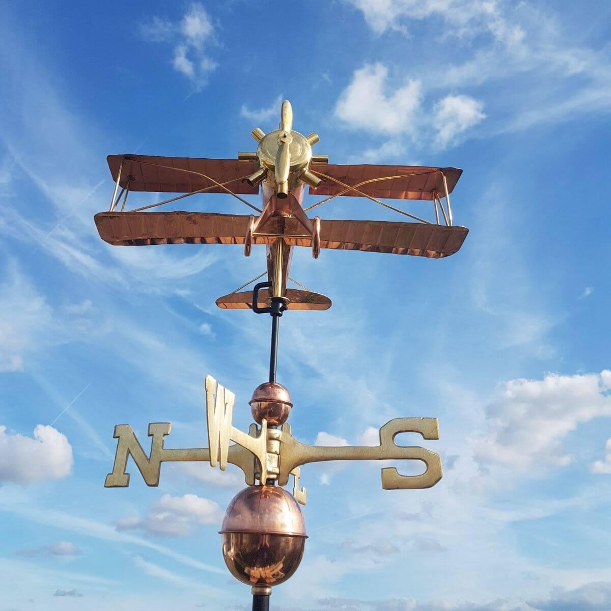 Large copper biplane weathervane