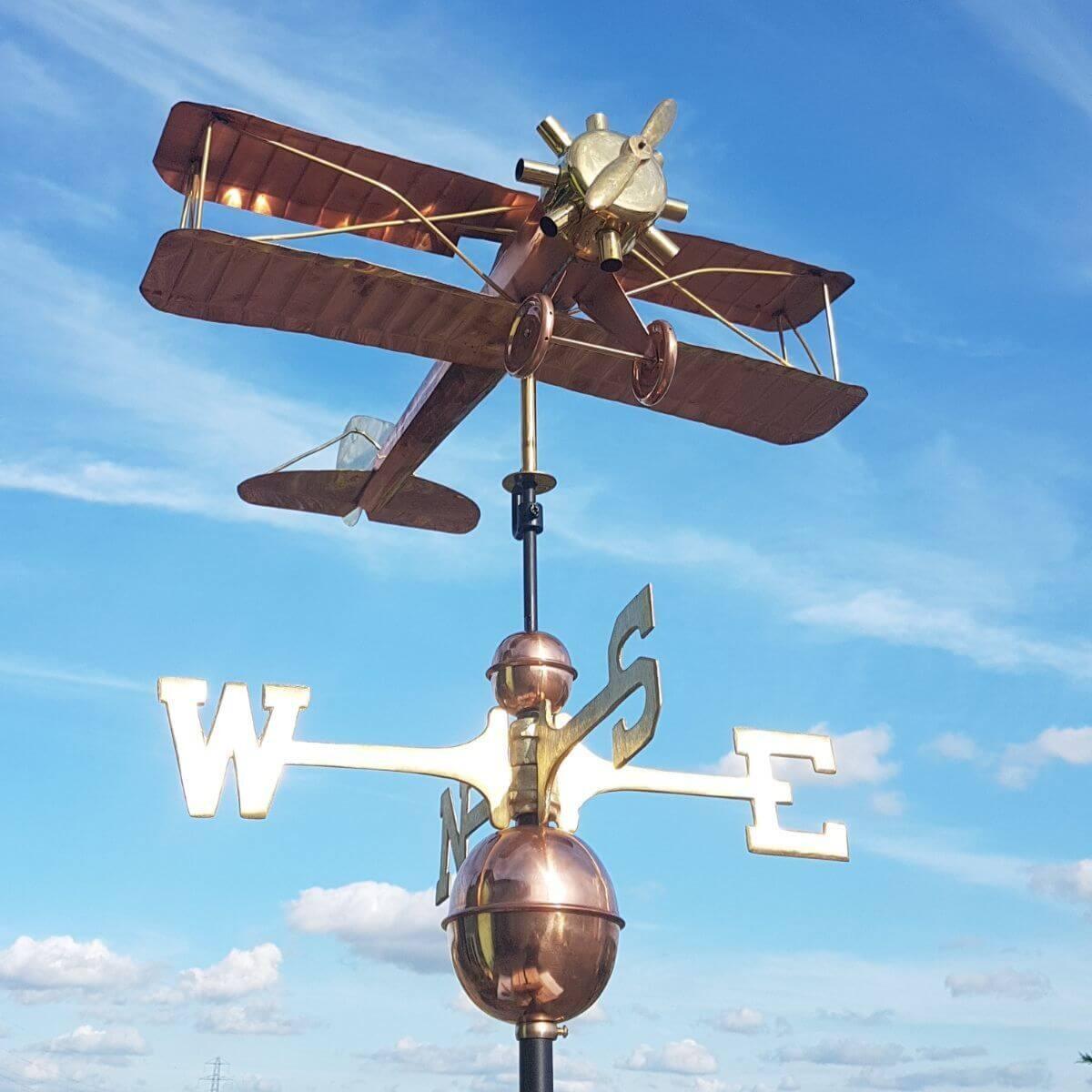 Large copper biplane weathervane