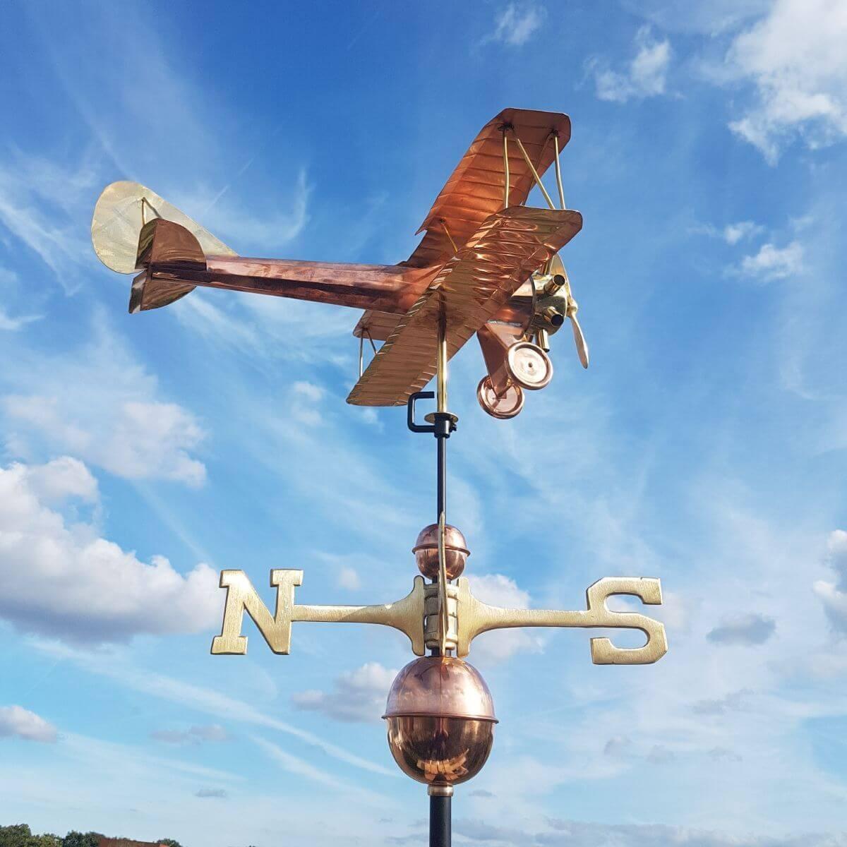 Large copper biplane weathervane