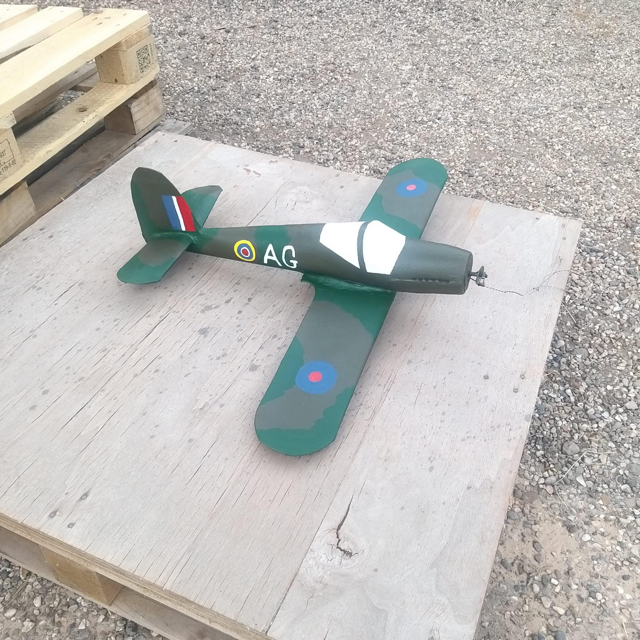 Spitfire weathervane with hand painting largely complete showing WWII camouflage and roundels