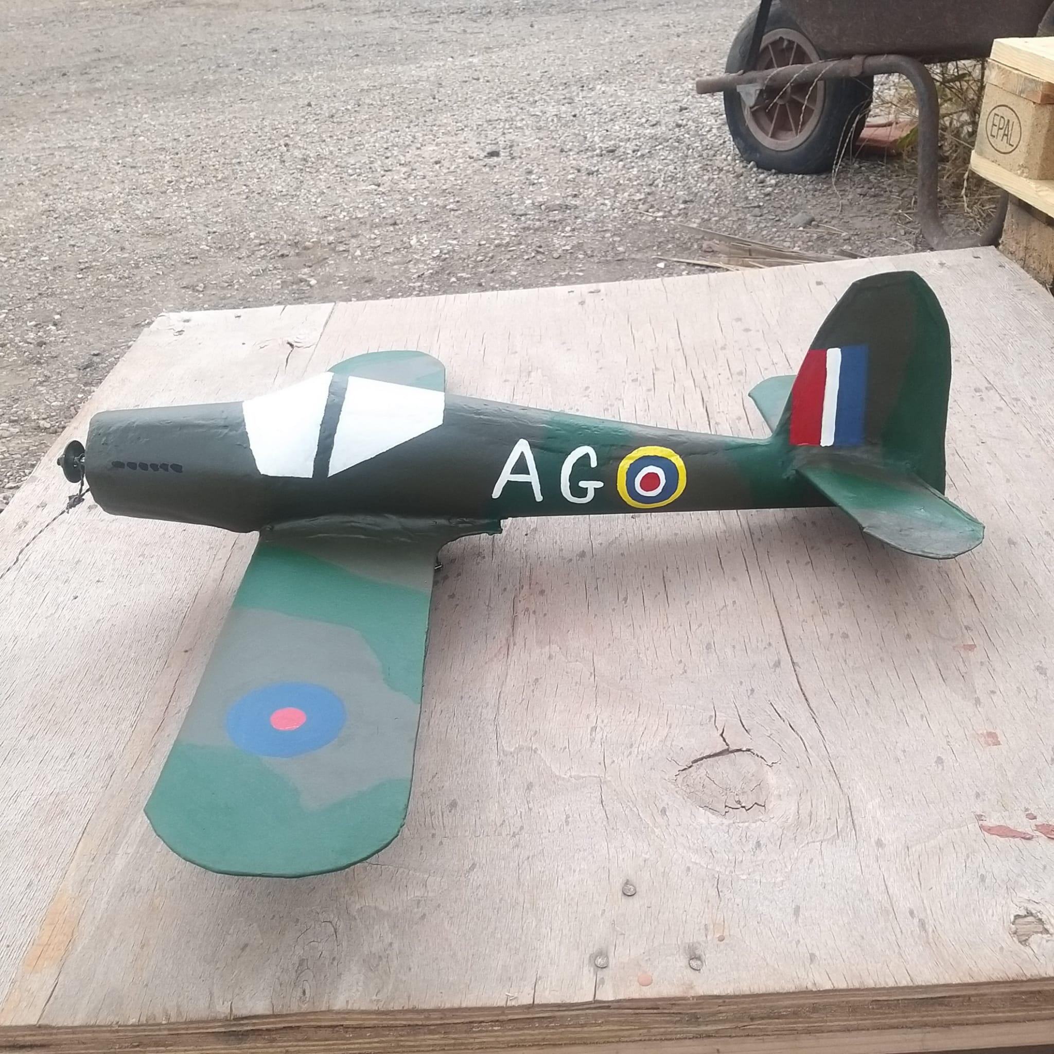 Finished hand painted Spitfire weathervane showing farmer initials AG painted on the fuselage