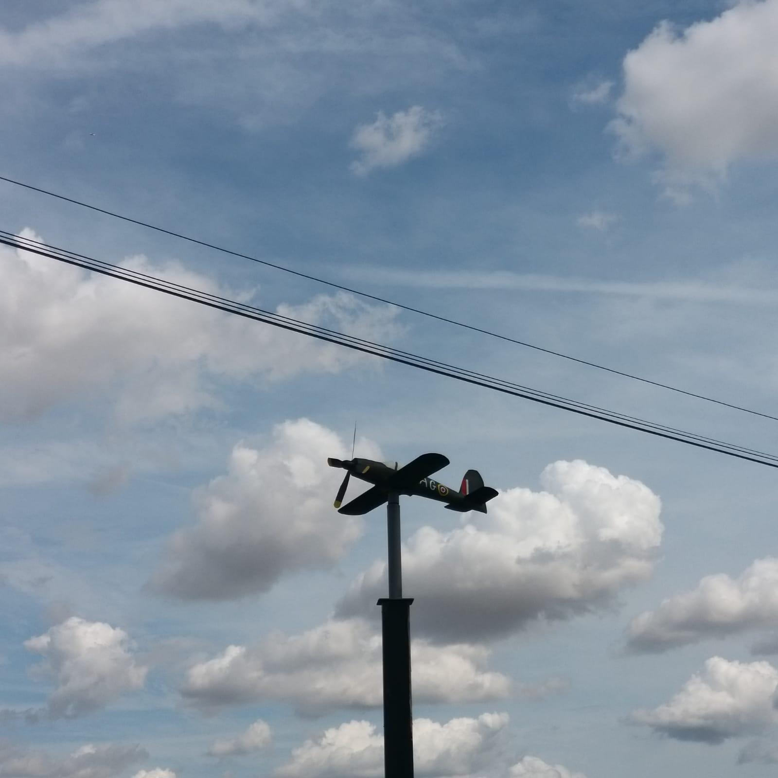 Restored and hand painted Spitfire weathervane installed and flying on the farm
