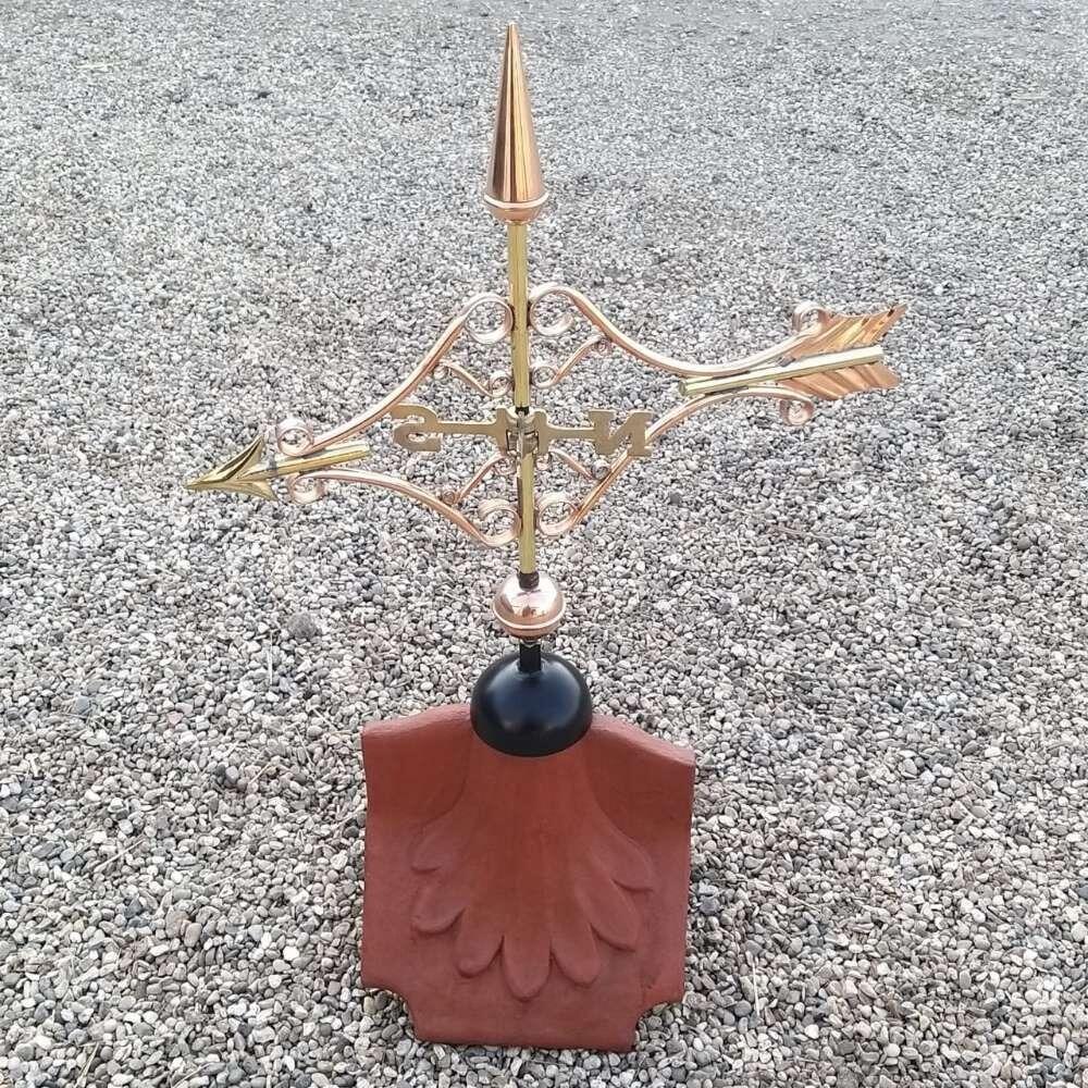 Victorian arrow weathervane installed on a ridge tile finial fitting with multiple angle options