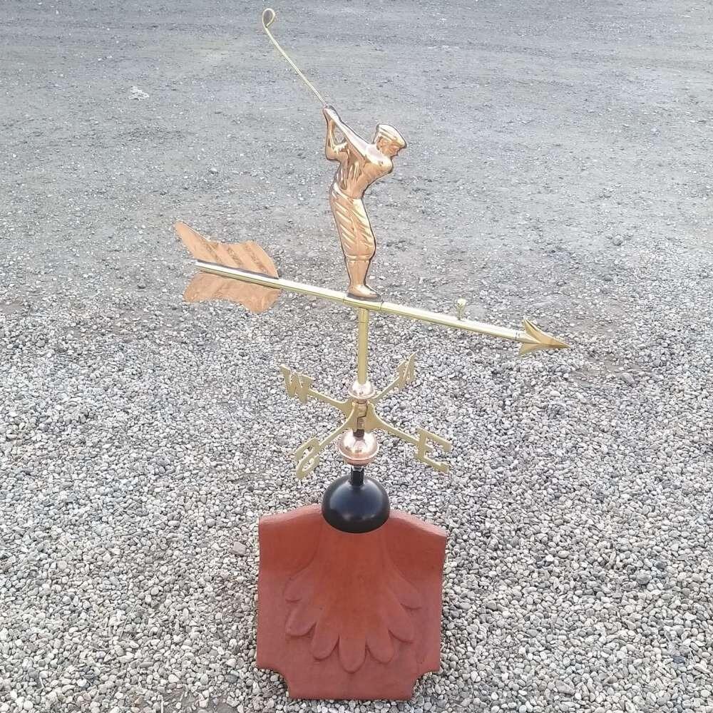 Golfer weathervane mounted on a ridge tile finial fitting with multiple angle options