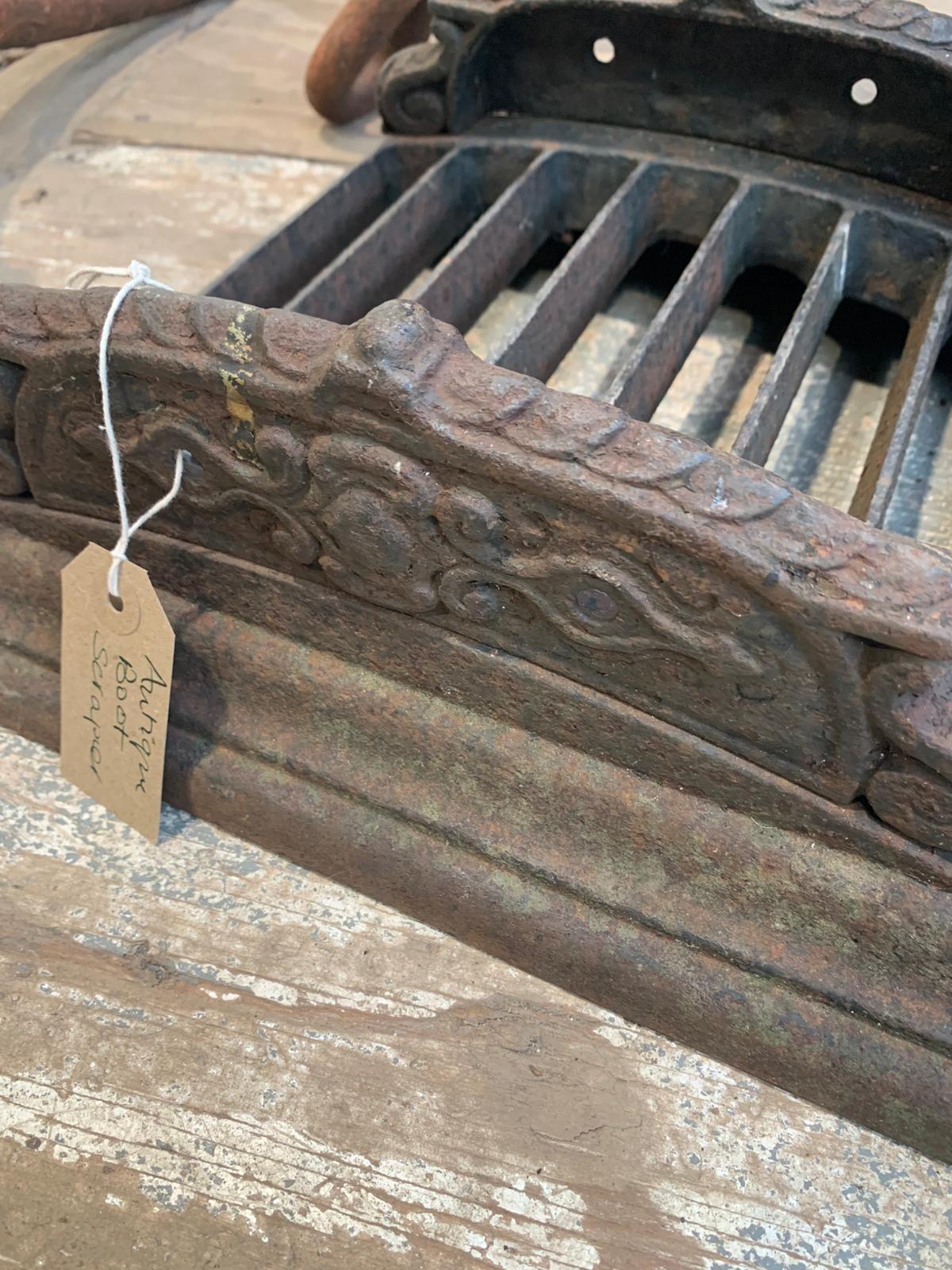 Antique cast boot scraper