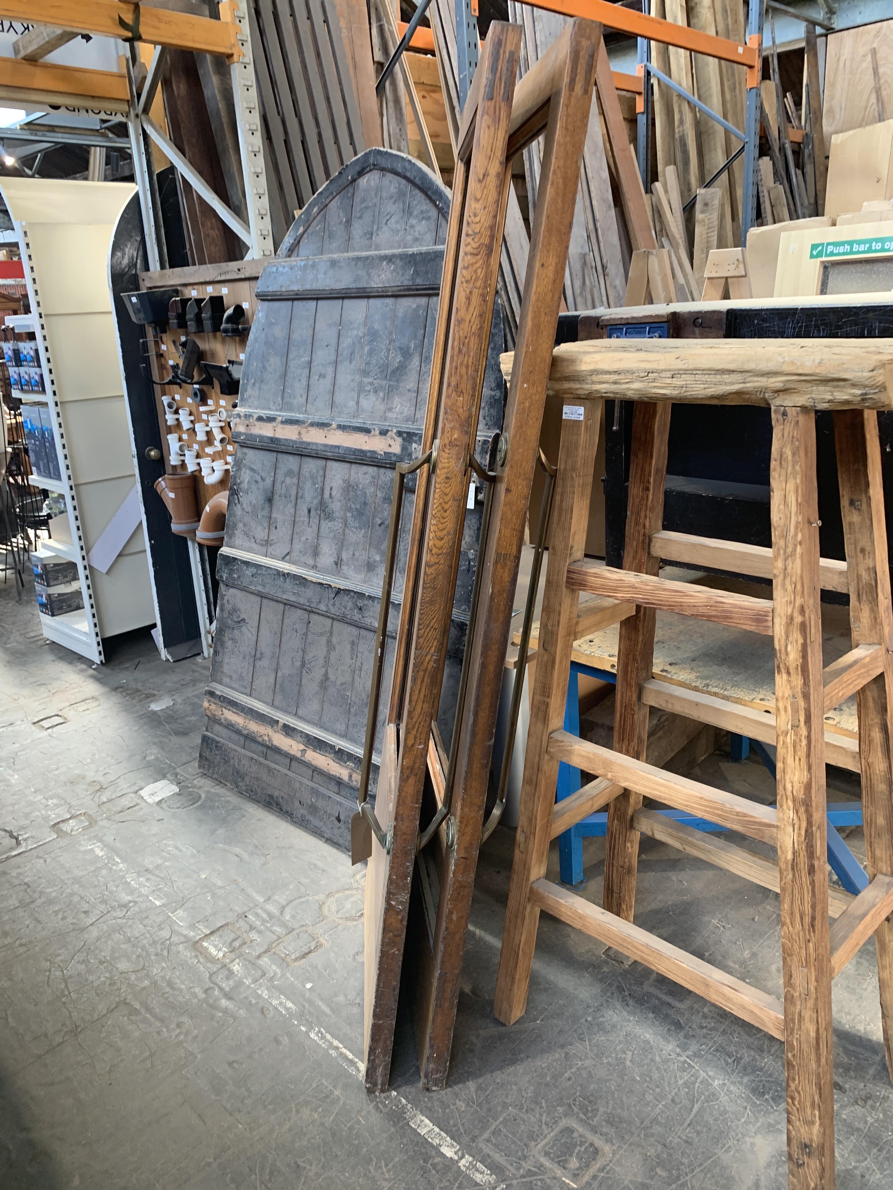 Pair of Reclaimed Wooden Doors with Missing Windows