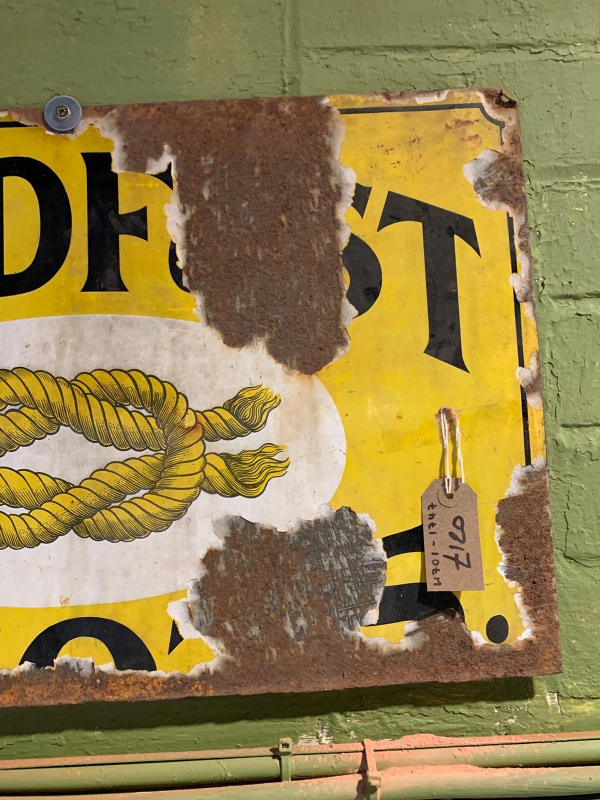 Metal Holdfast boots sign