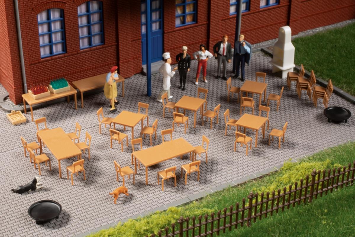 tables and chairs on model rail layout