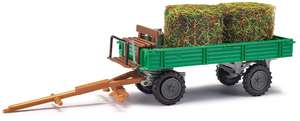 Busch 210005911 Tractor trailer with hay rolls and milk churns