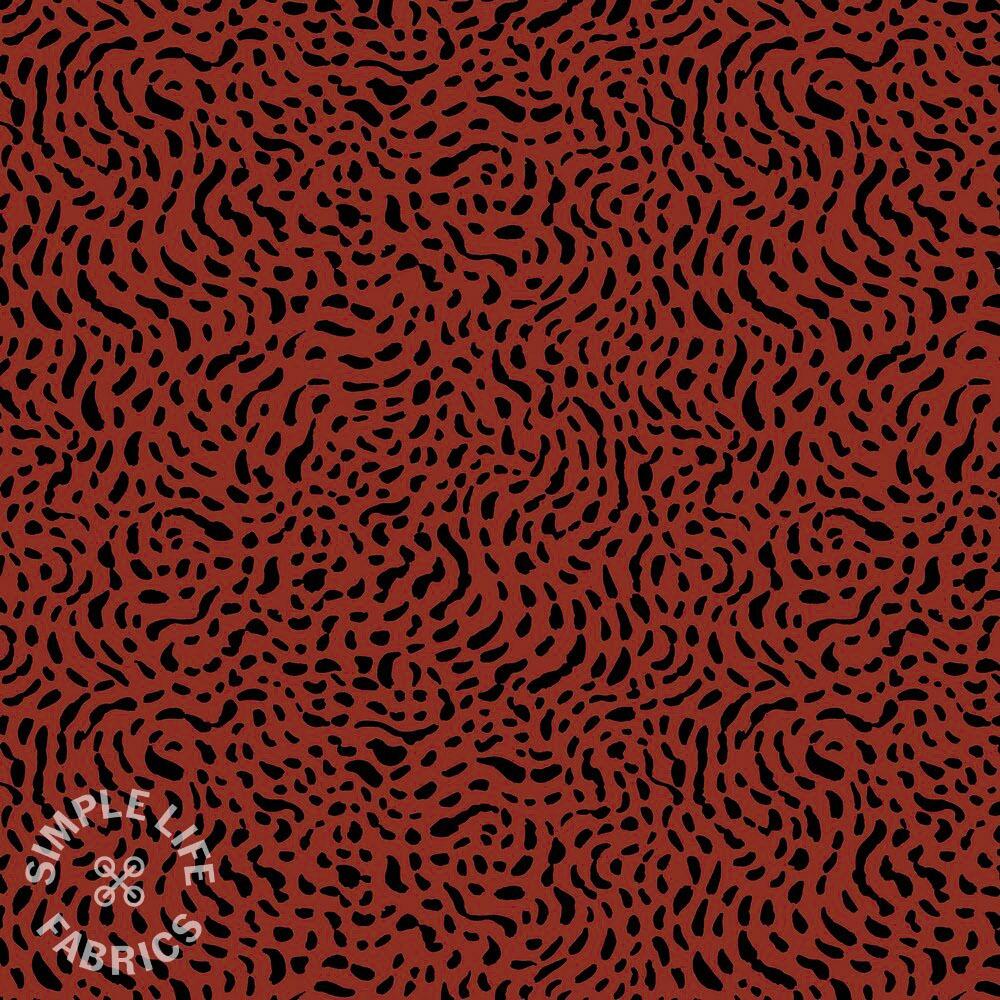 Animal print jersey red brown fabric