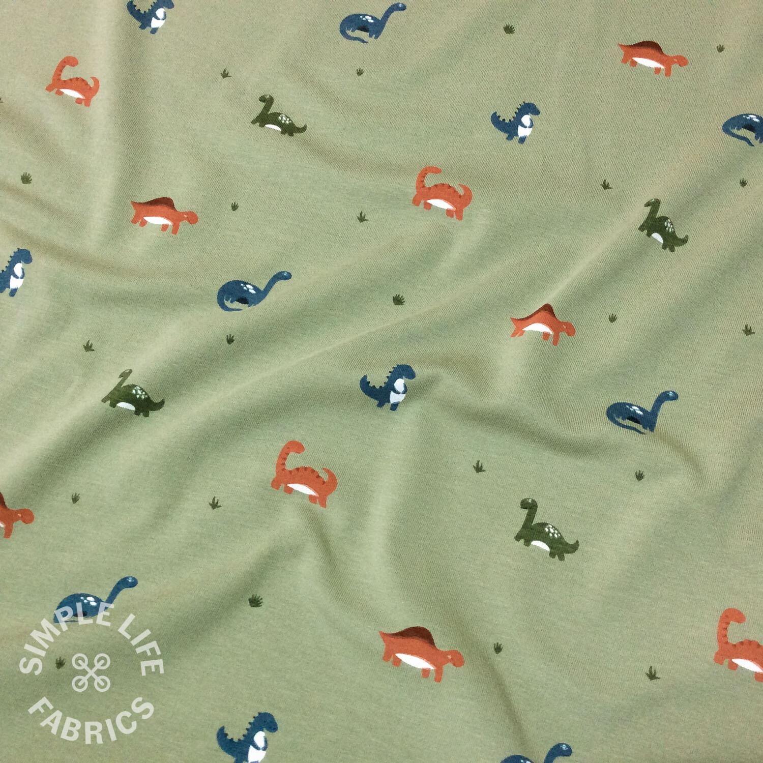 cute little dinosaurs jersey fabric