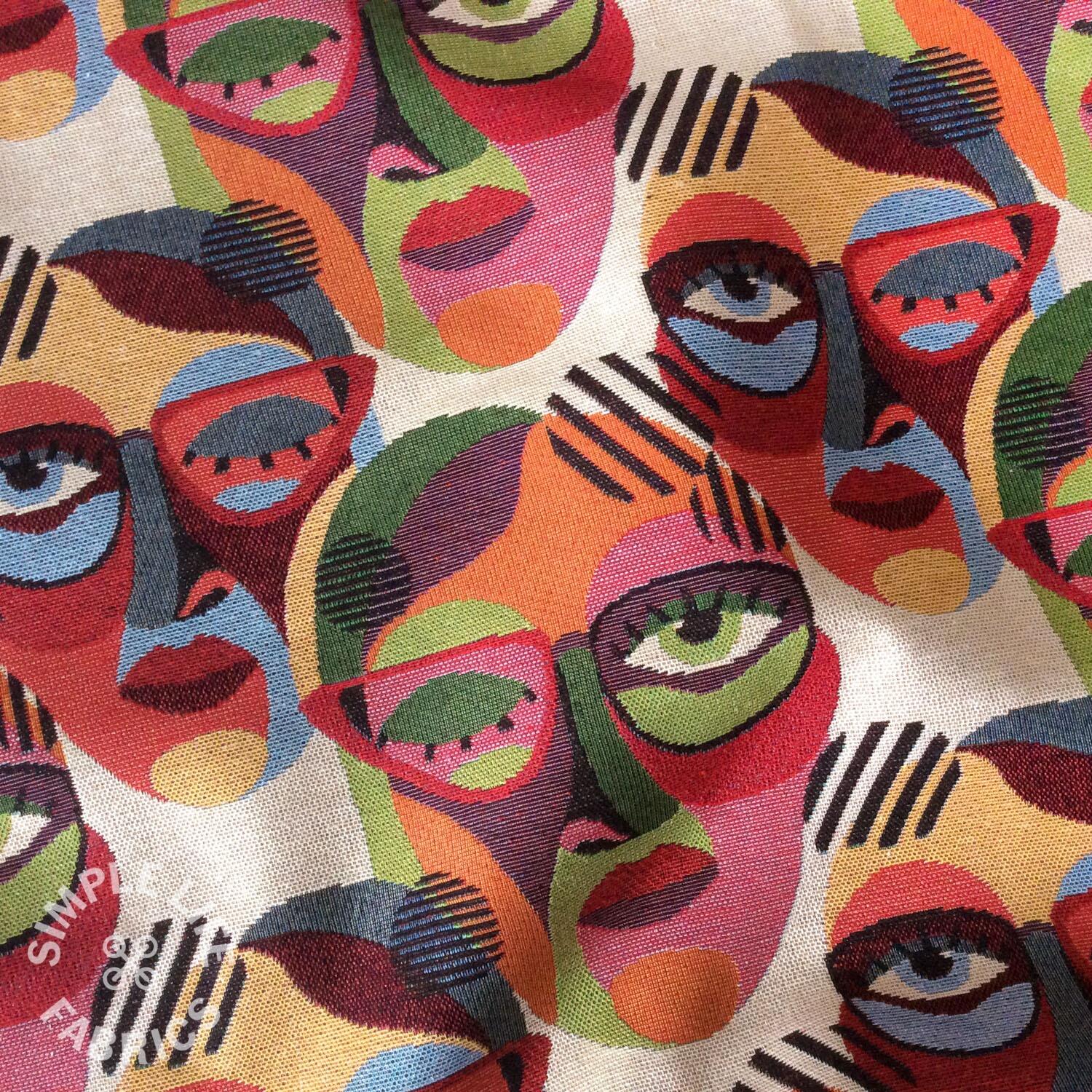 Tapestry designer fabric with colourful faces