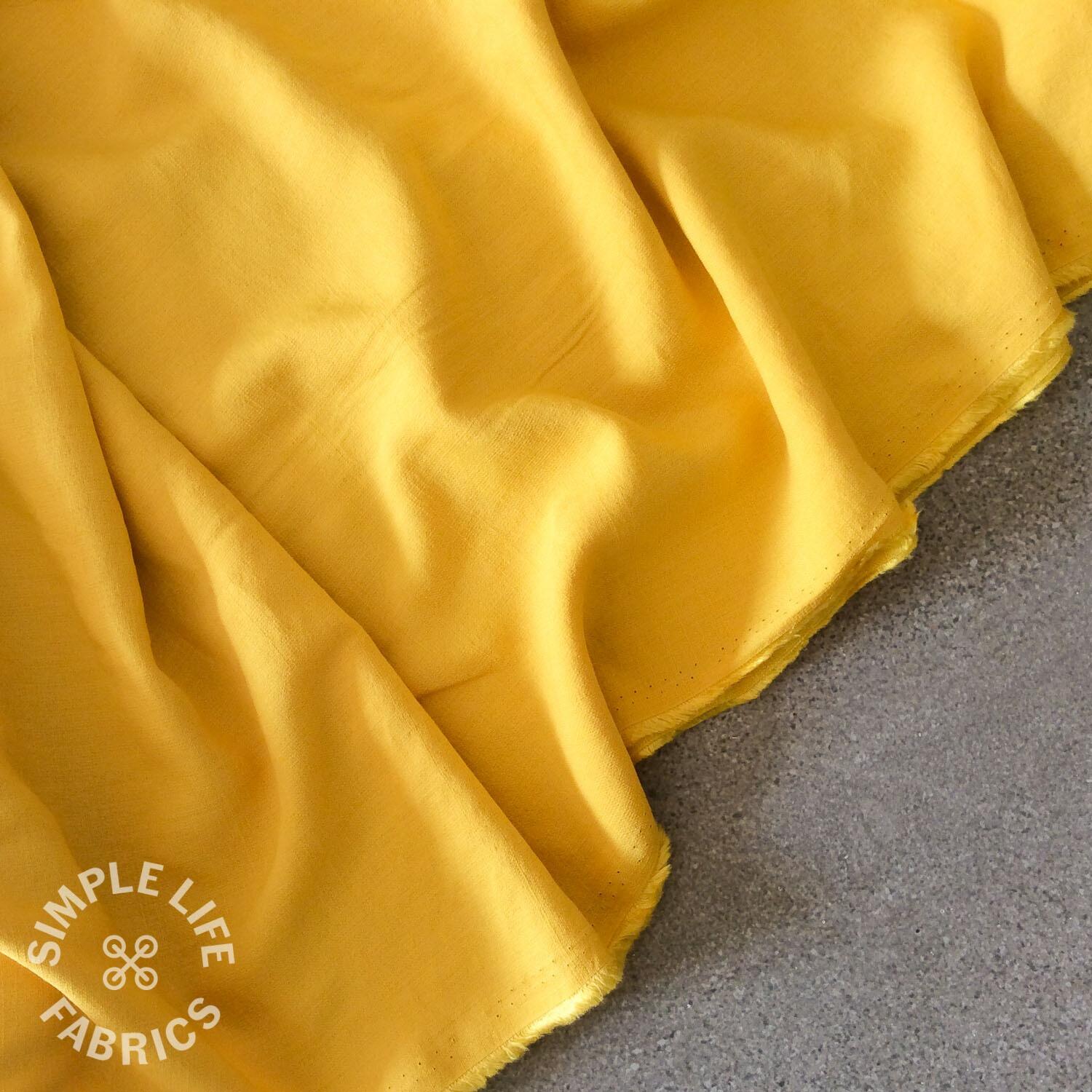 Yellow golden plain slub dress fabric
