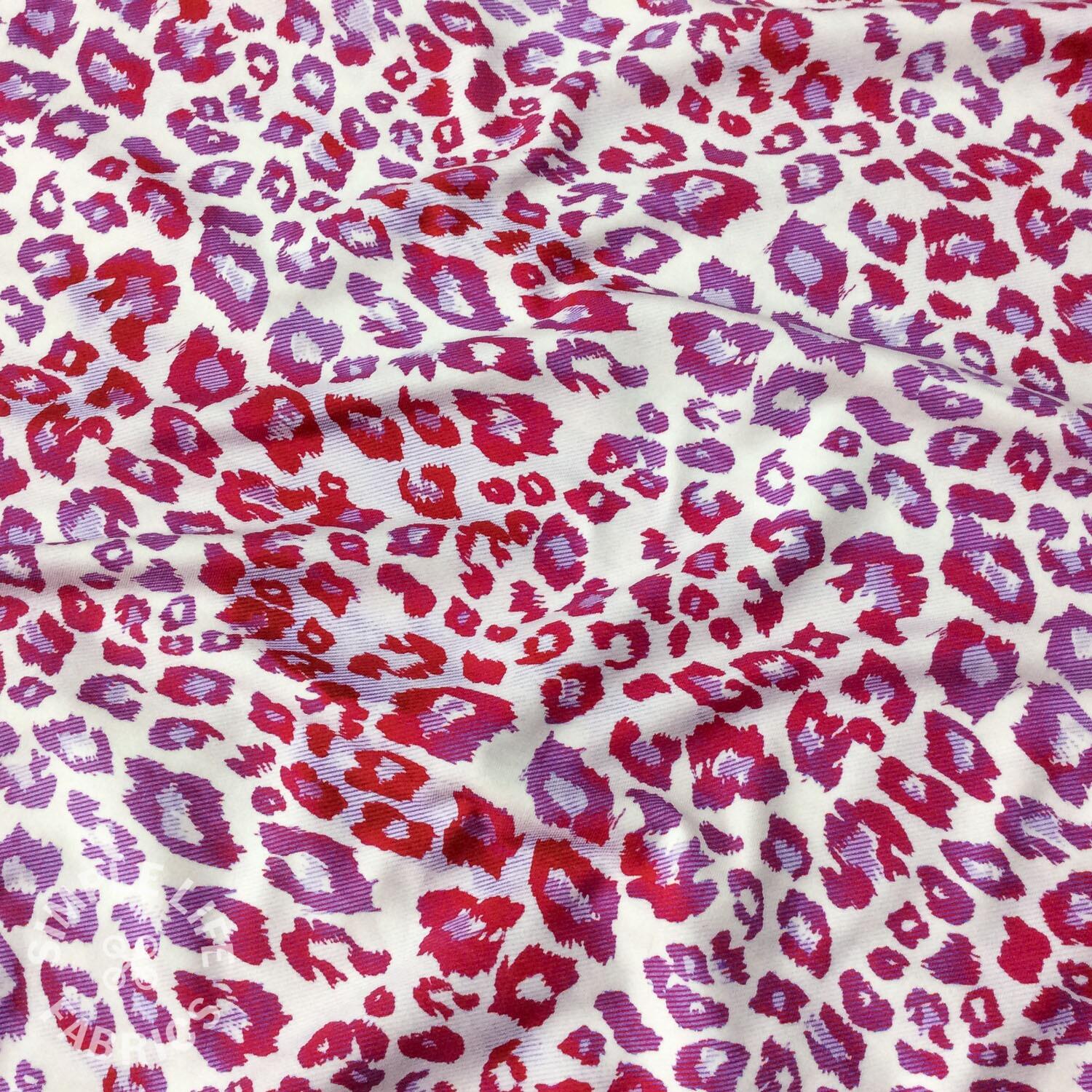 Pink and white animal print fabric