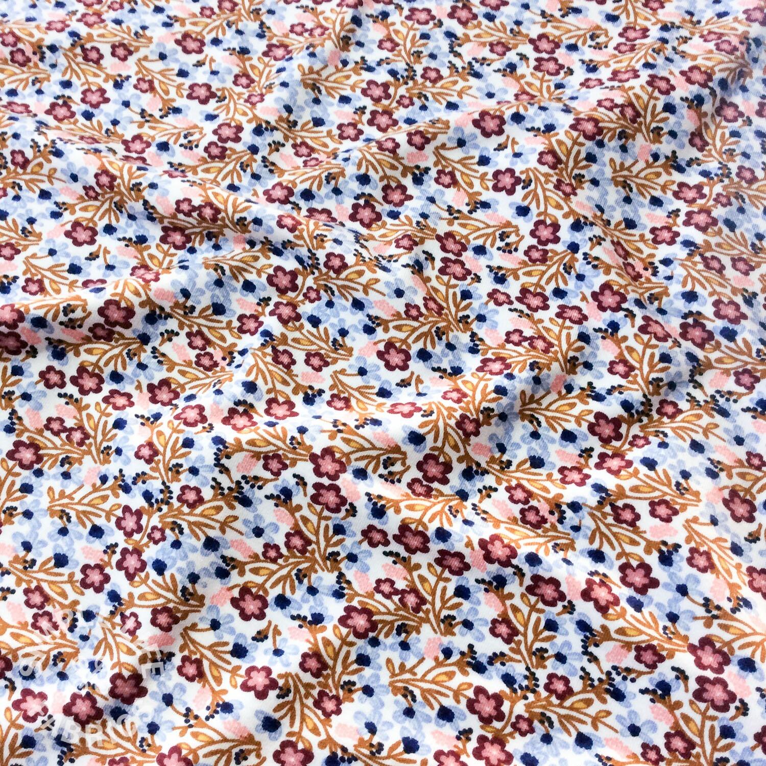 Trailing ditsy floral organic jersey fabric