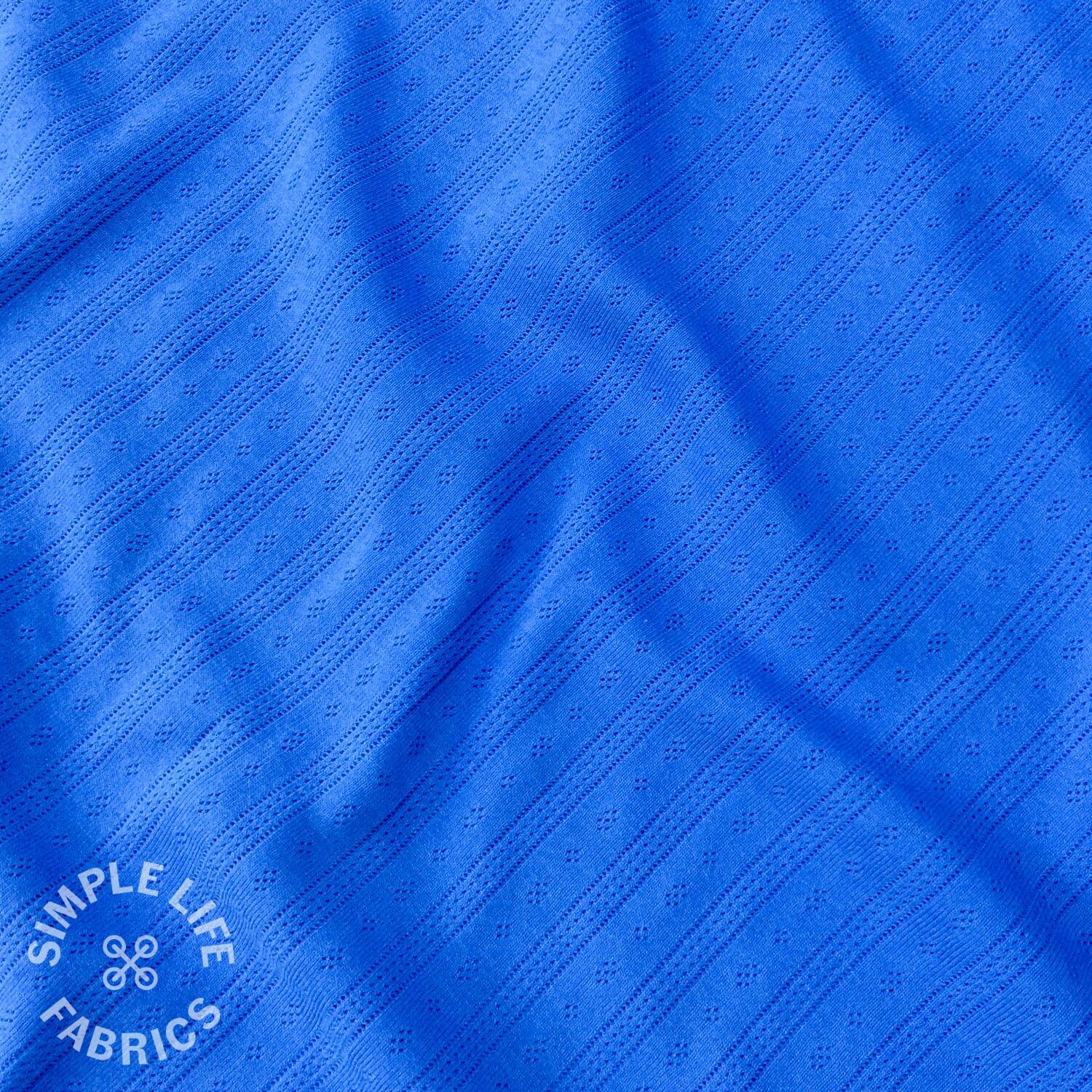 Broderie anglaise jersey fabric royal blue