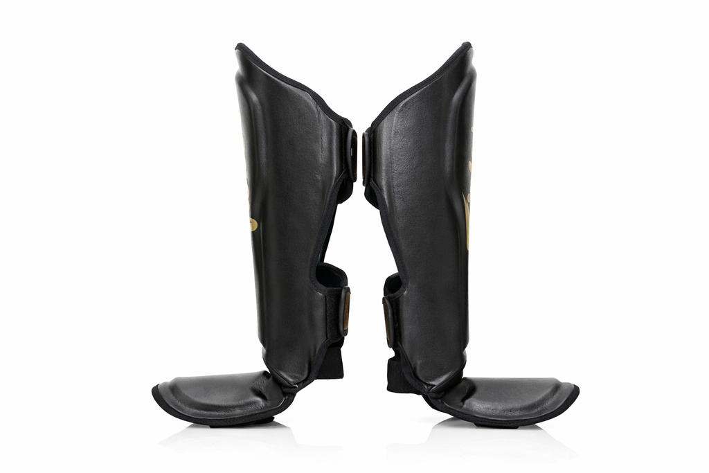 shin  Fairtex x Booster FXB Shin guards Black & Gold