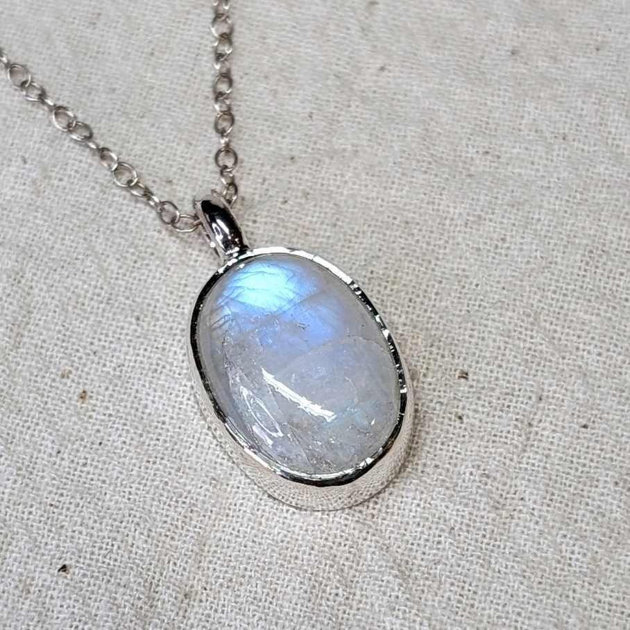 Oval Moonstone Pendant with Moon engraving on reverse, handmade in Scotland with recycled sterling silver