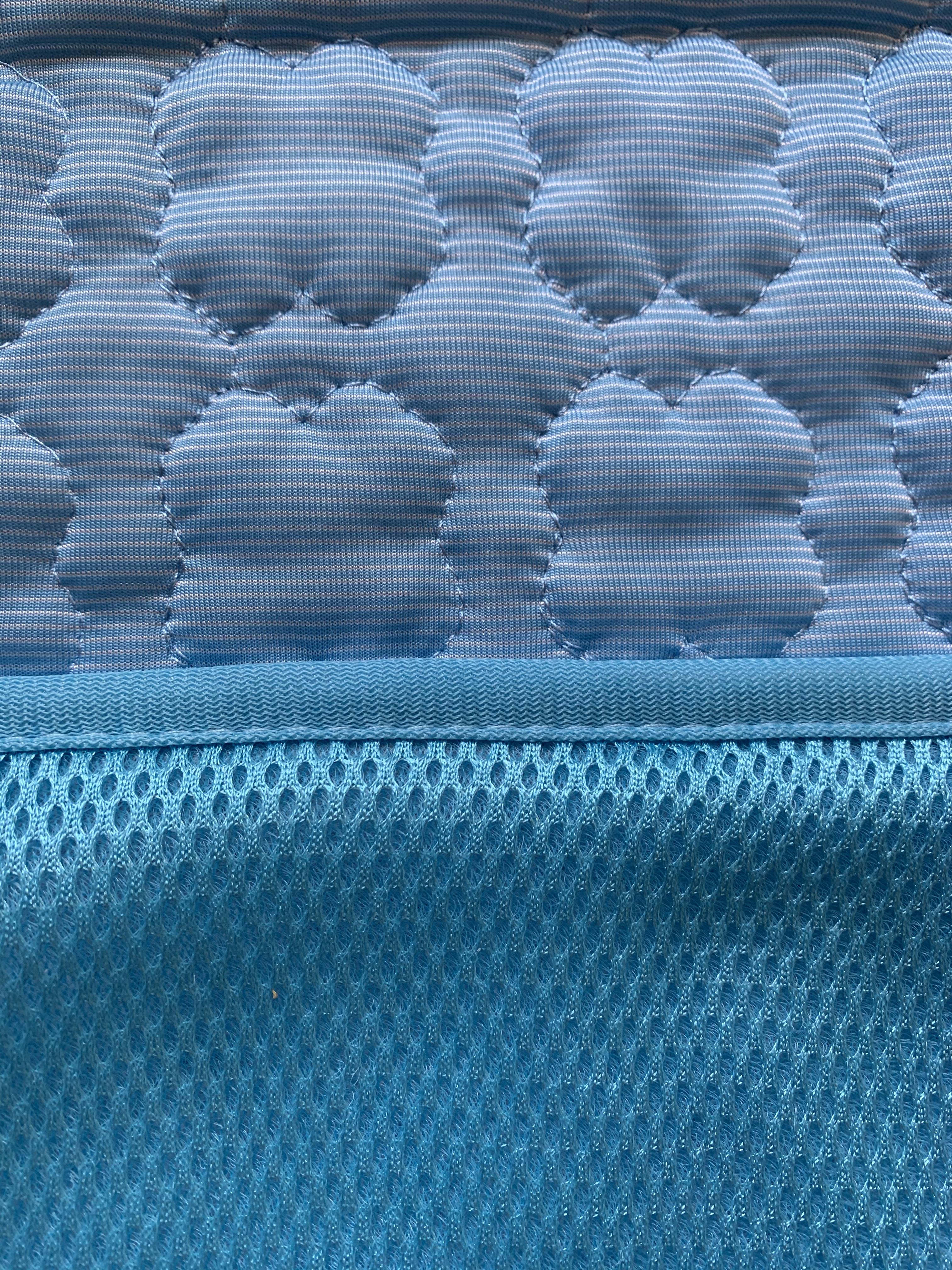 Close up of blue cooling mat material