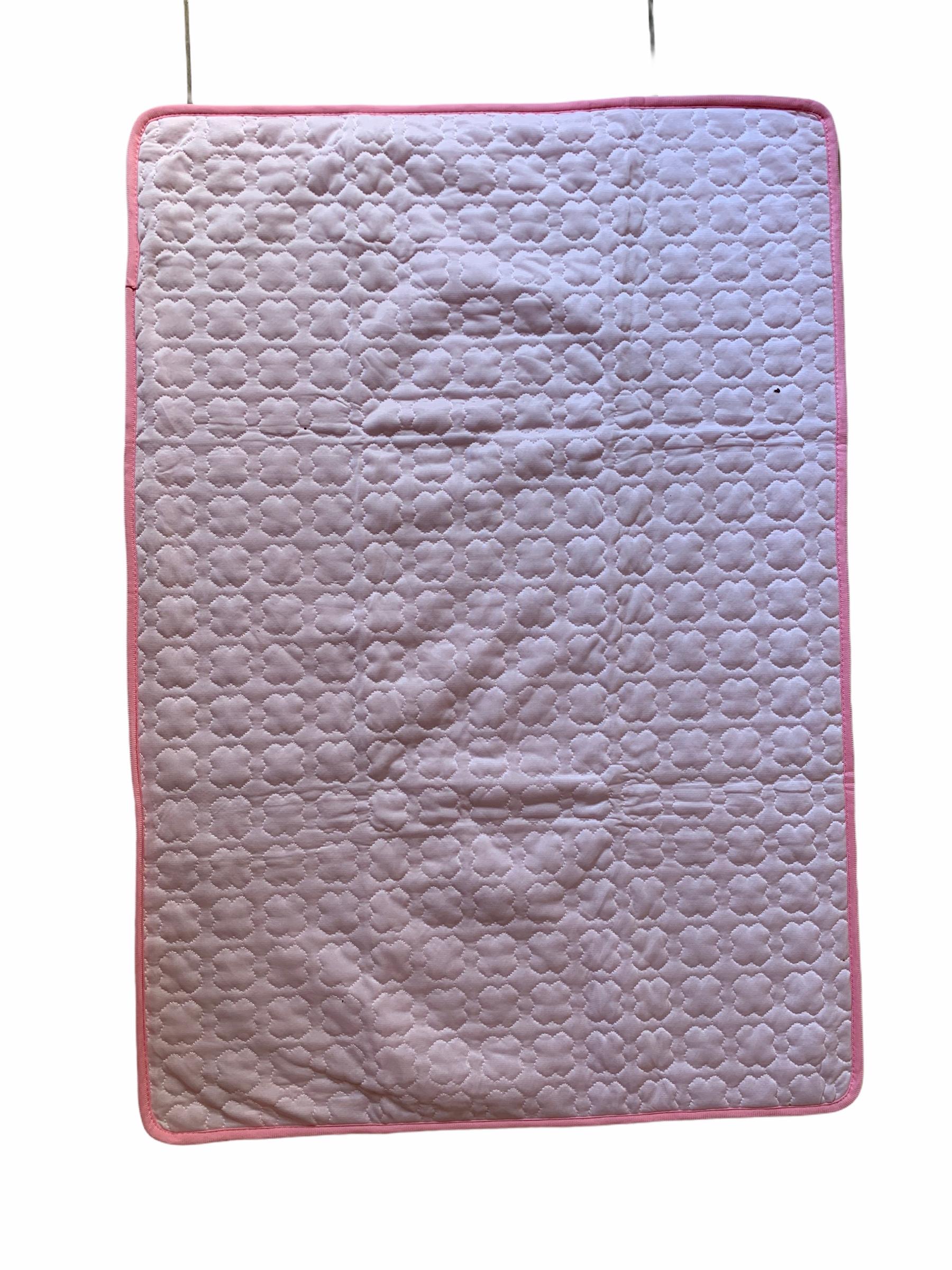 Close up of pink cooling mat material