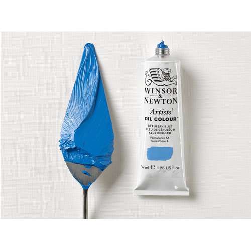 a tube of Winsor and Newton Artists Oil colour paint and a palette knife covered with paint