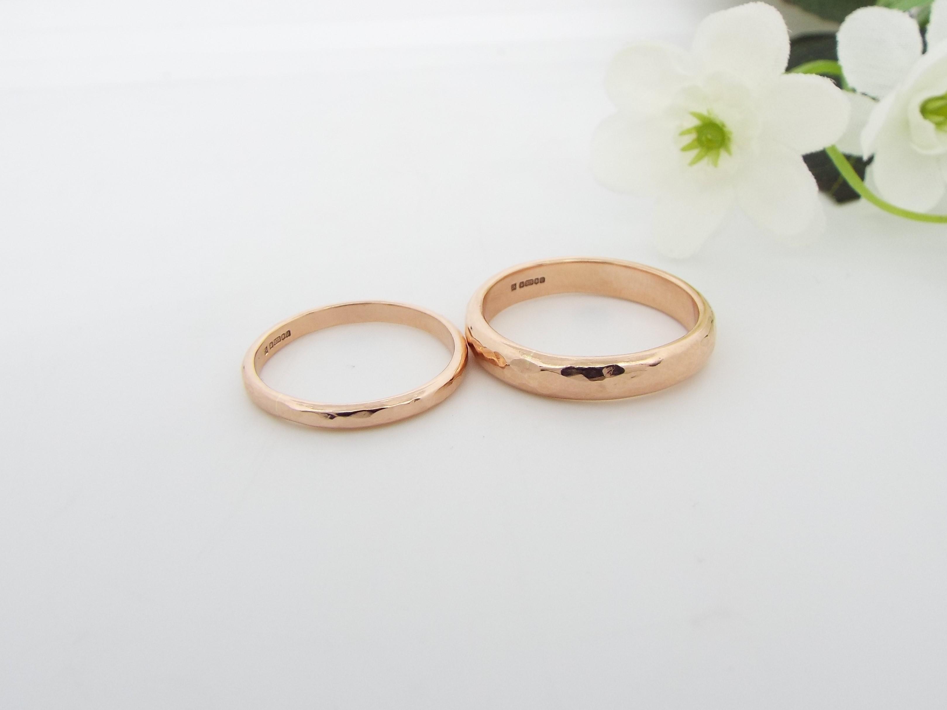 pair of hammered rose gold wedding bands