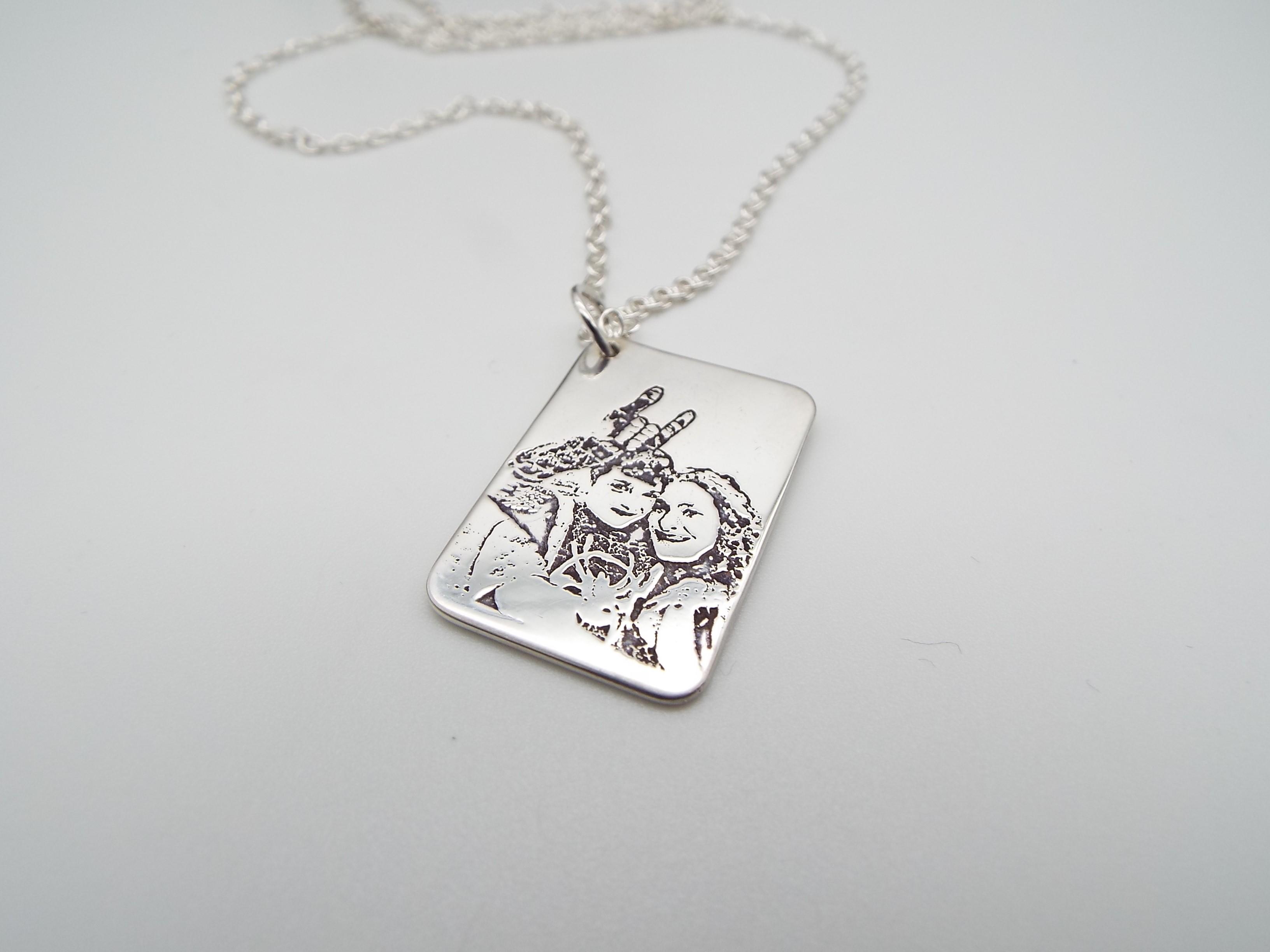 photo engraved into silver necklace