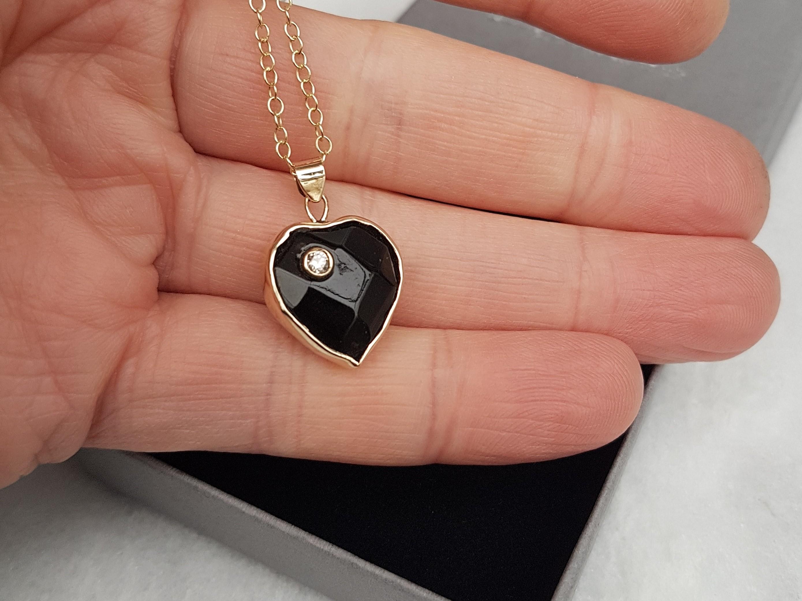 Black Jade Pendant set in in 9ct with a diamond