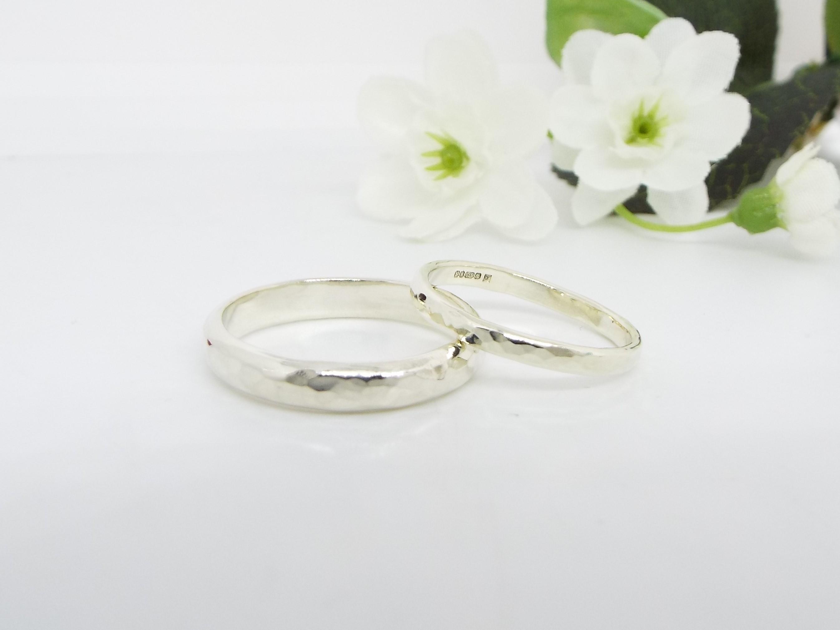 His and hers matching white gold wedding rings