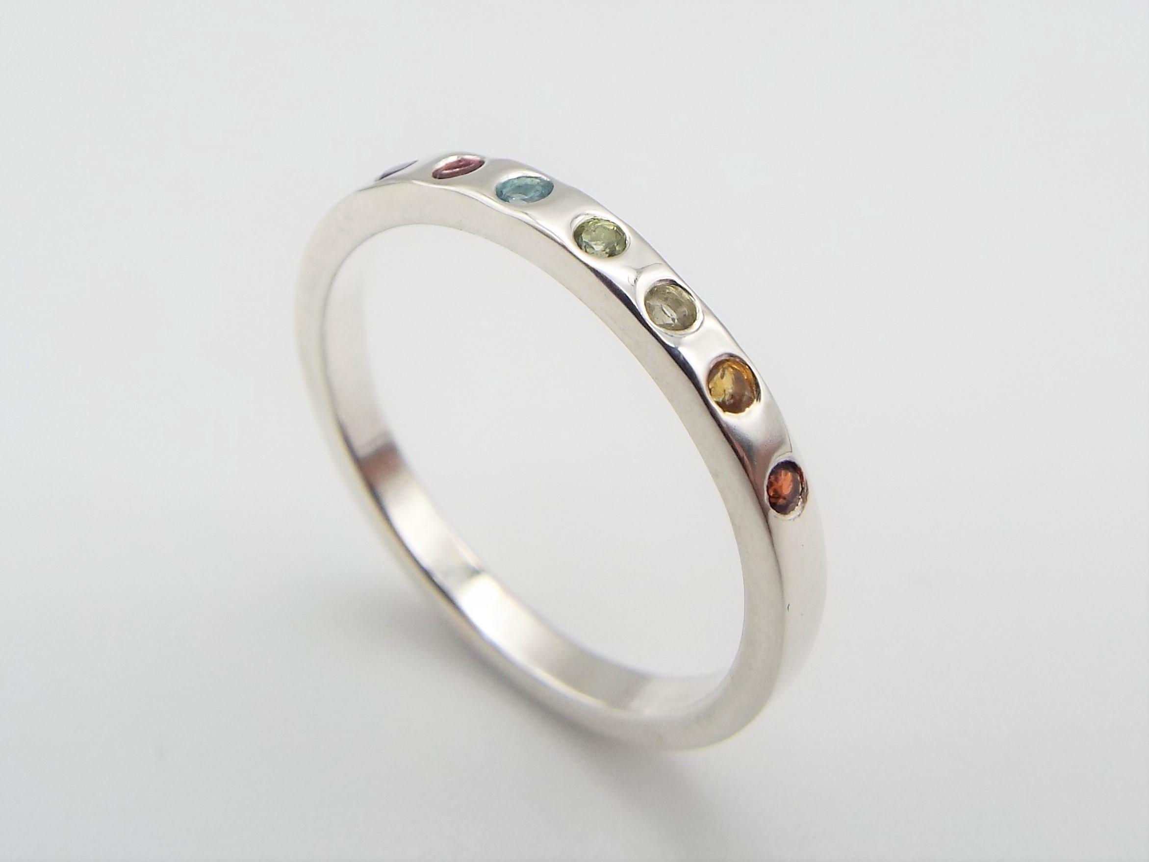 Sterling silver ring set with 7 rainbow gemstones