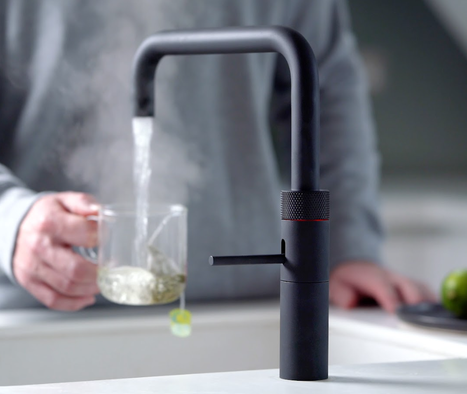 Quooker Fusion Square in Black making cup of tea with boiling water