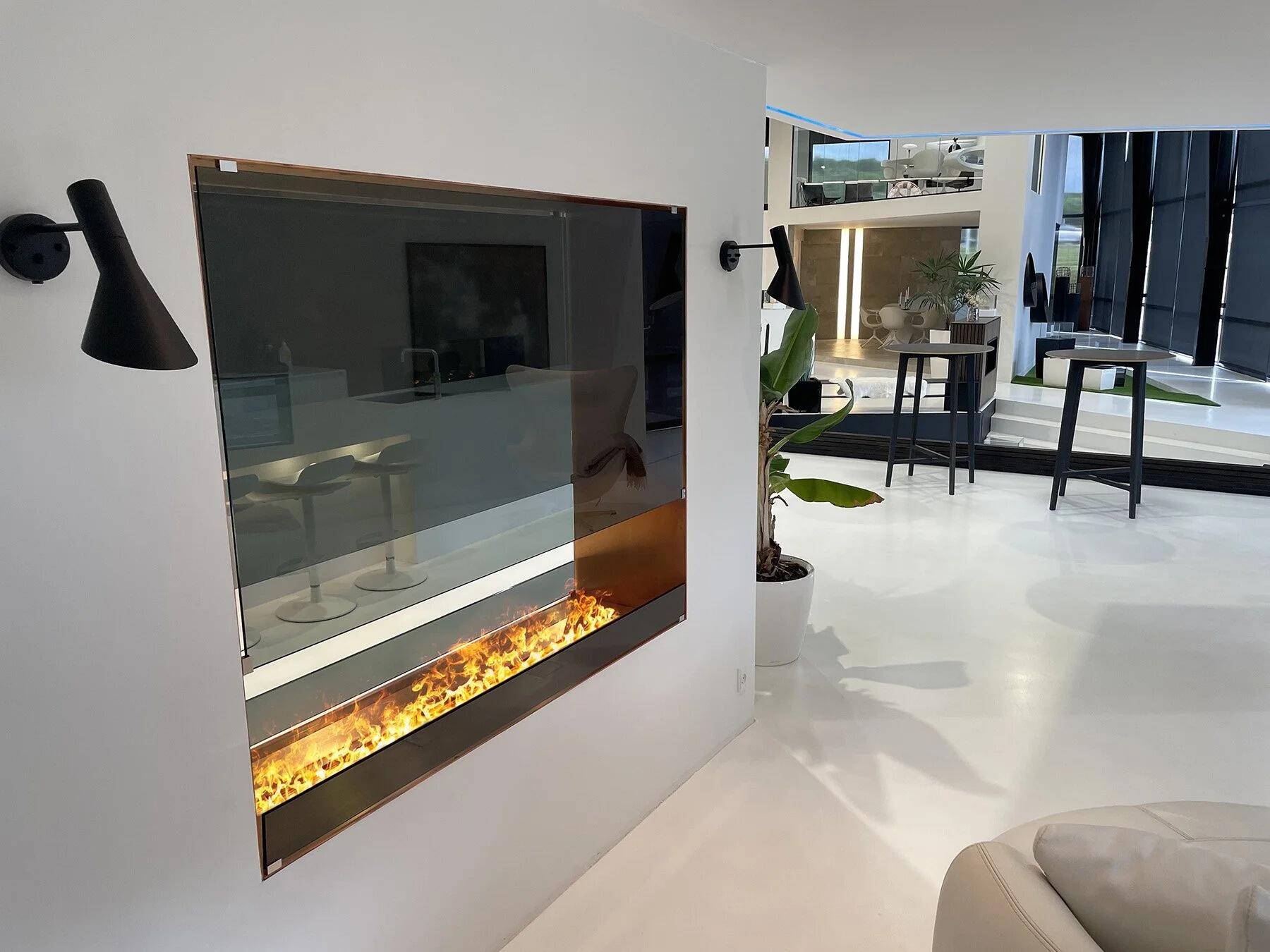 Decoflame Montreal Vue Hybrid Mist water vapour fire with tall glass panel in a white showroom wall