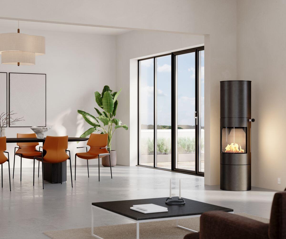 Rais Viva L 160 Bio stove in an open dining and living room with orange chairs