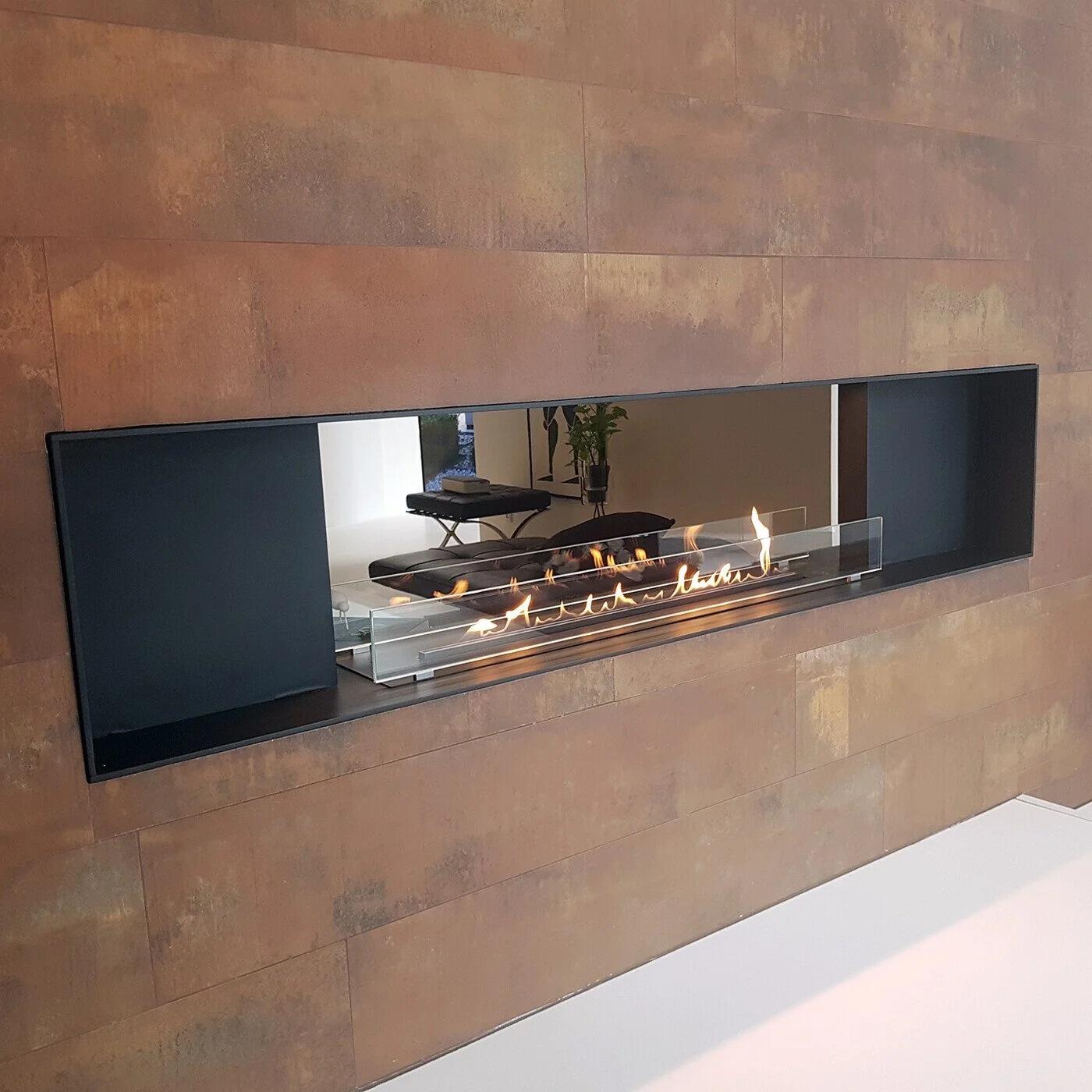Montreal Panorama fire with glass doors partly open in a rust-effect wall