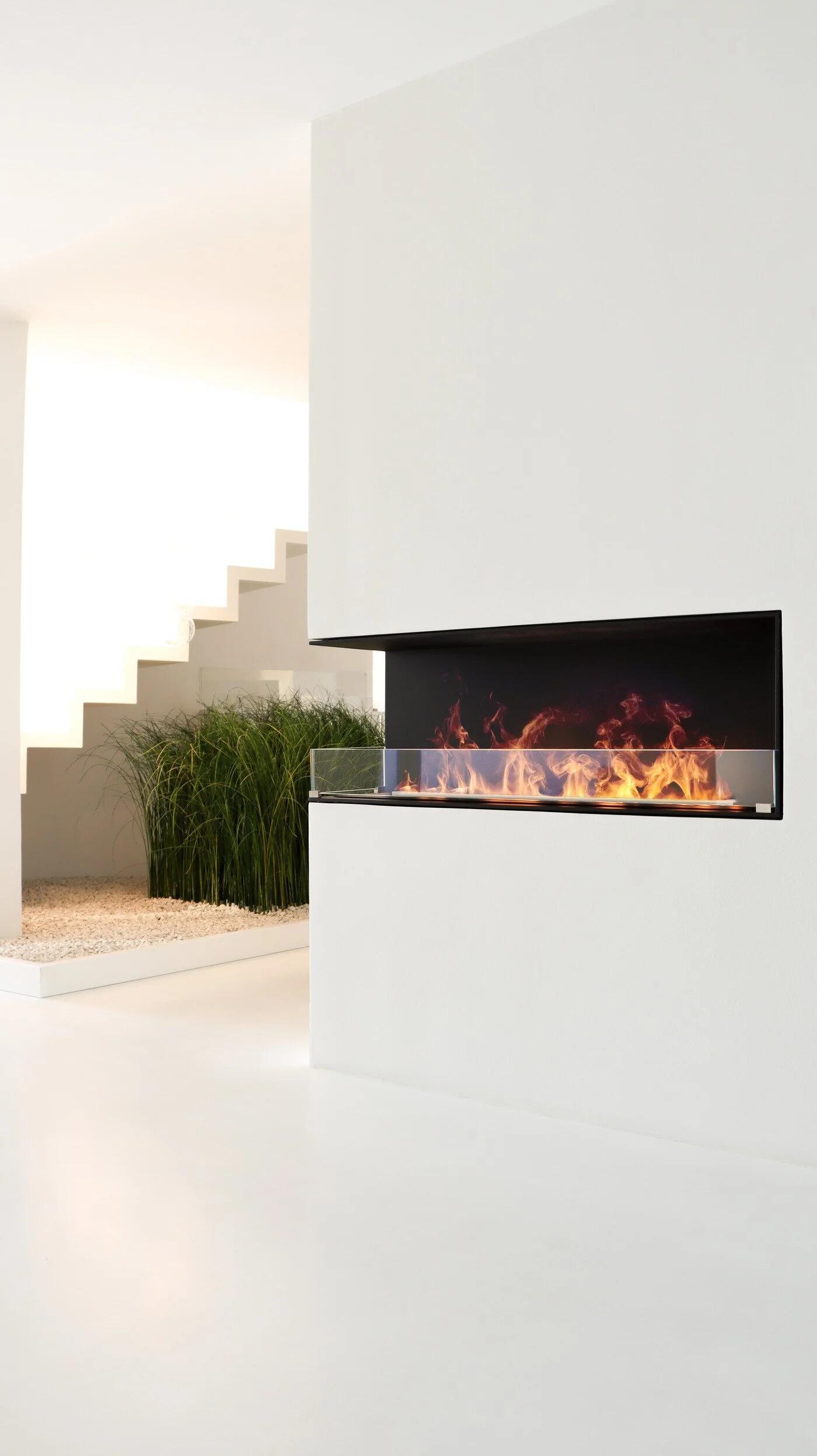 Montreal Hybrid Mist corner fire in a tall white wall near a staircase