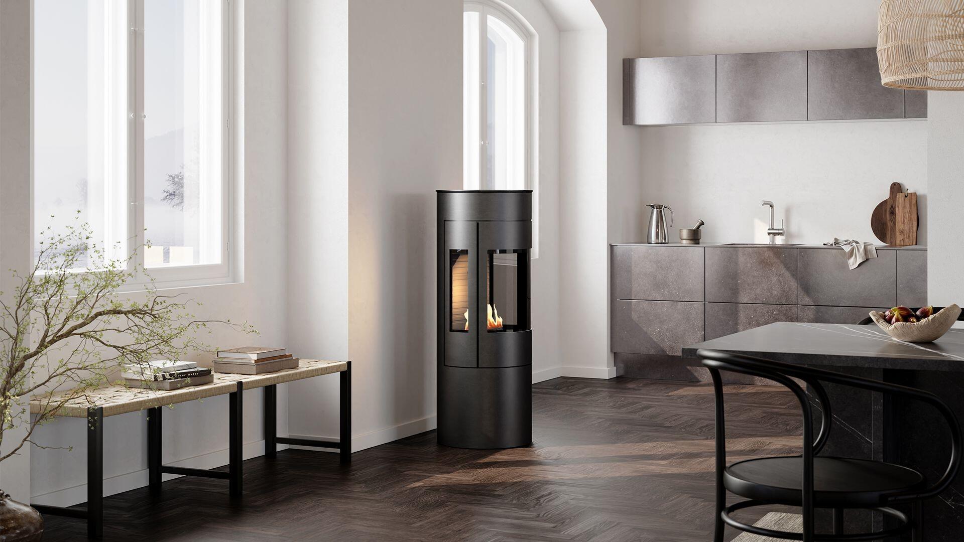 Rais Viva L 120 Bio bioethanol stove beside a kitchen island under a beamed ceiling