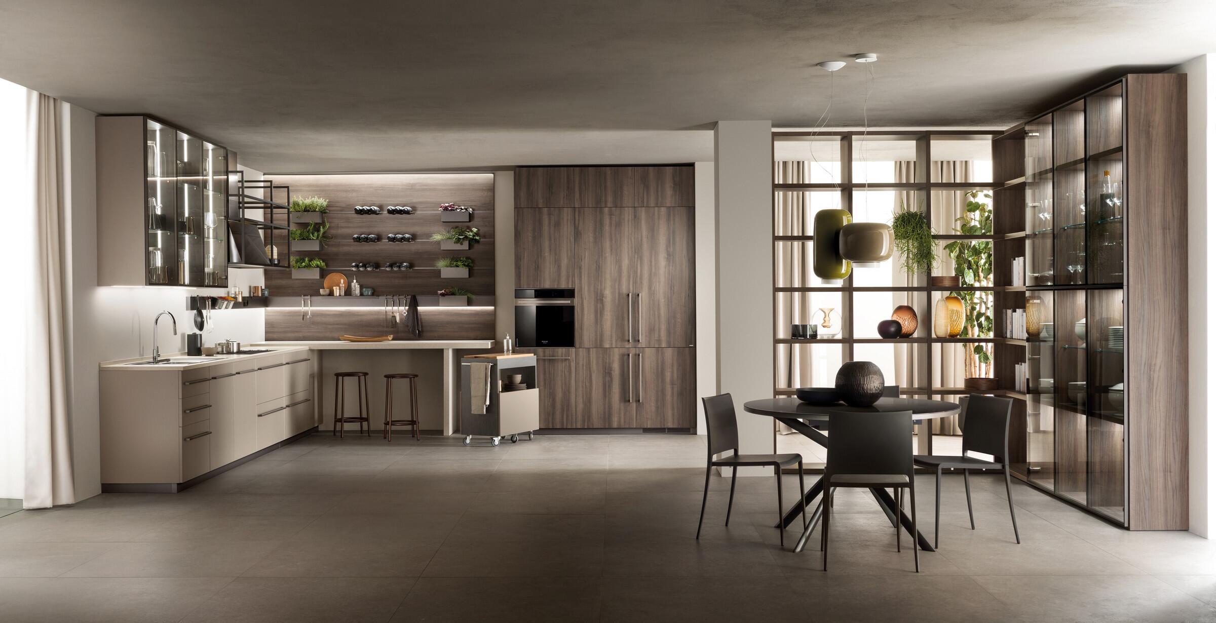 Scavolini MIA by Carlo Cracco kitchen with hanging storage and a dining area
