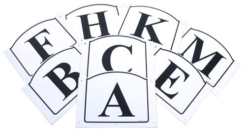 8 white plastic panels with letters