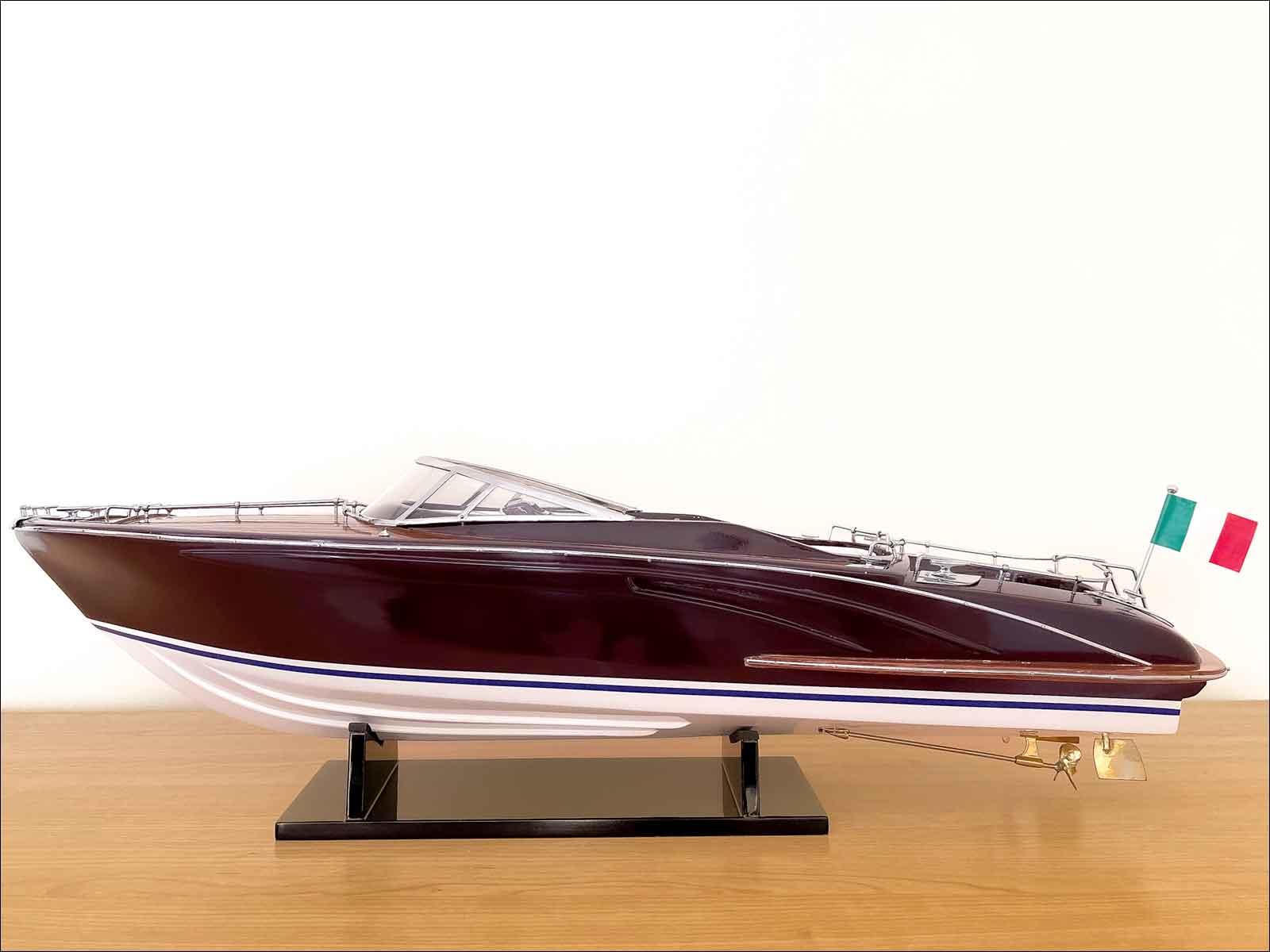 Rivarama 44 model boat with dark purple hull