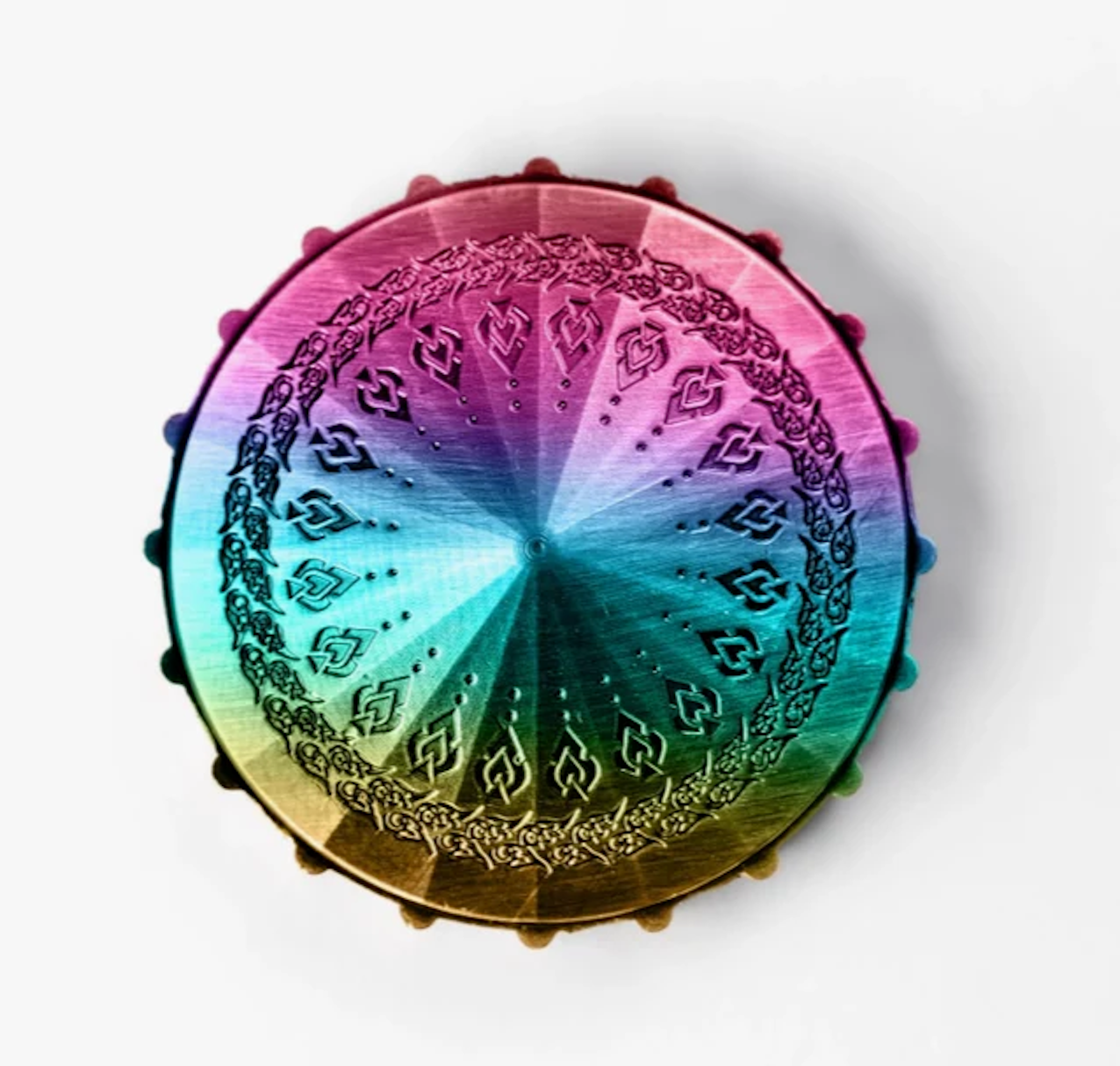 Close‑up of torched rainbow finish on D20 spinner