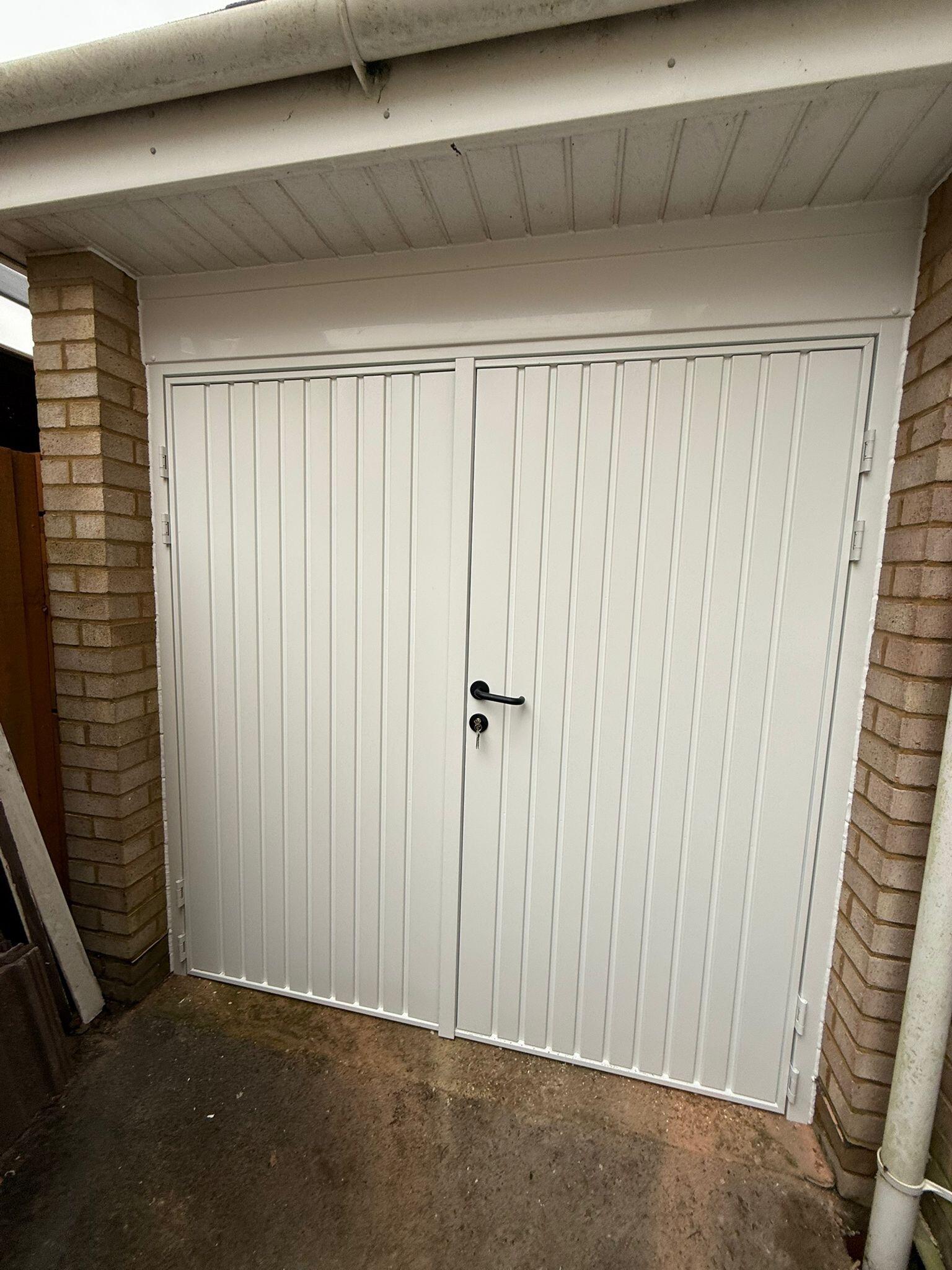 Side Hinged Garage Door in Steel, White finish