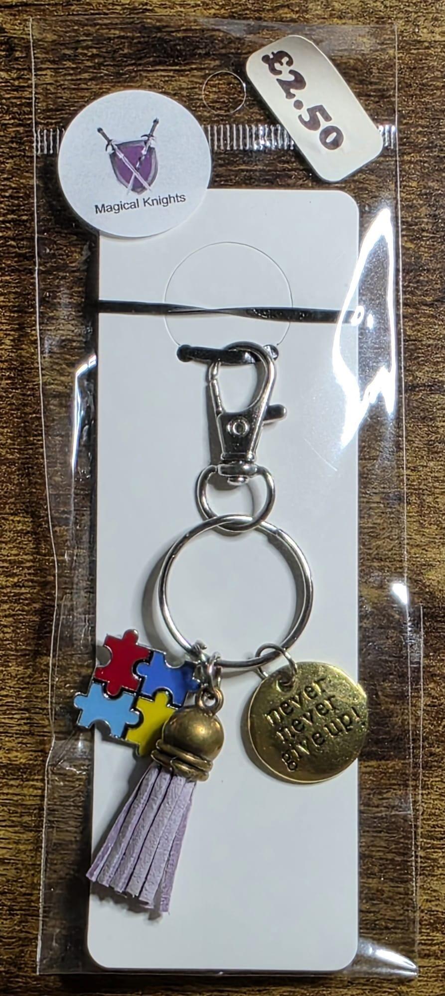 Autism keyring never give up lilac tassel