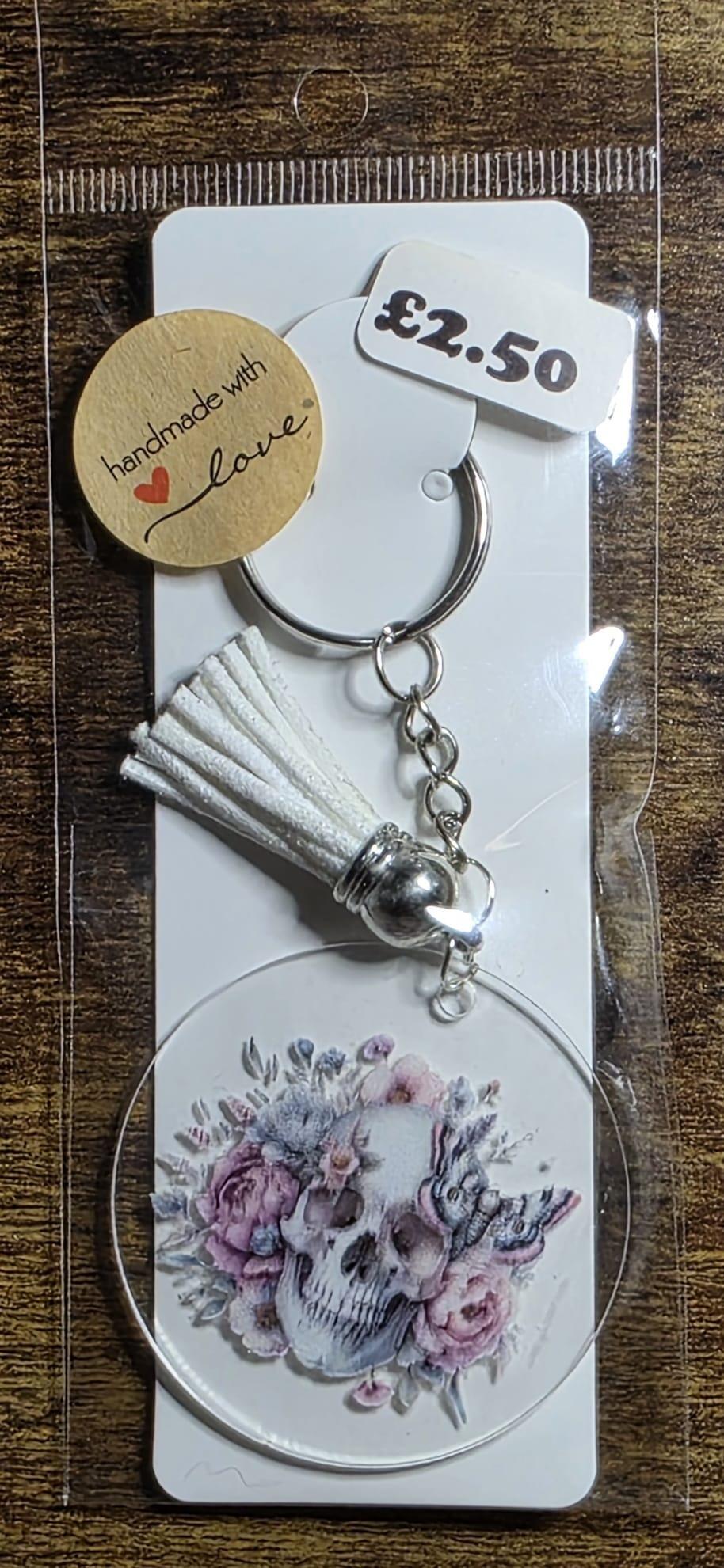 skull face moth white tassel