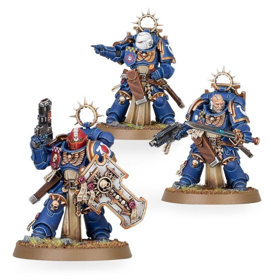 Warhammer 40K Space Marine miniatures including Primaris Intercessors, vehicles, and named characters