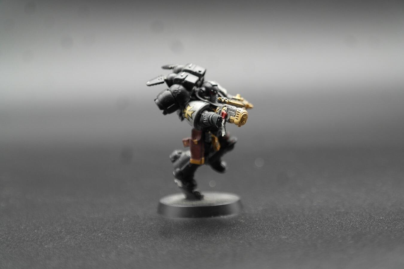 Side profile showing jump pack thruster detail - plasma pistol