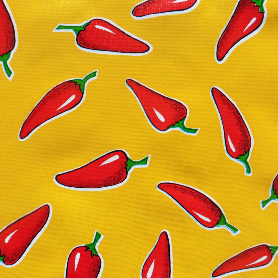 Red Chillies Pepper on Yellow Oilcloth