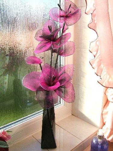 Purple Flower and Black Vase Display