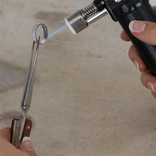 Hand held torch soldering silver ring